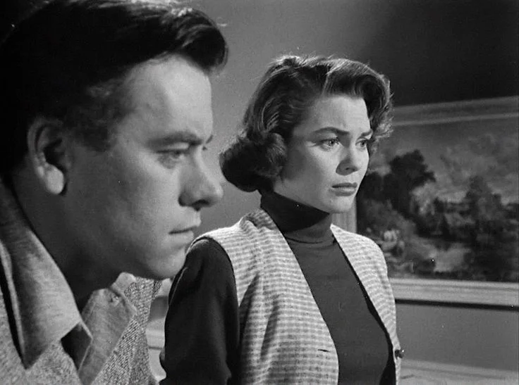 Elements of noir: Burden and Anne Stanton (Joanne Dru) at Burden’s Landing.