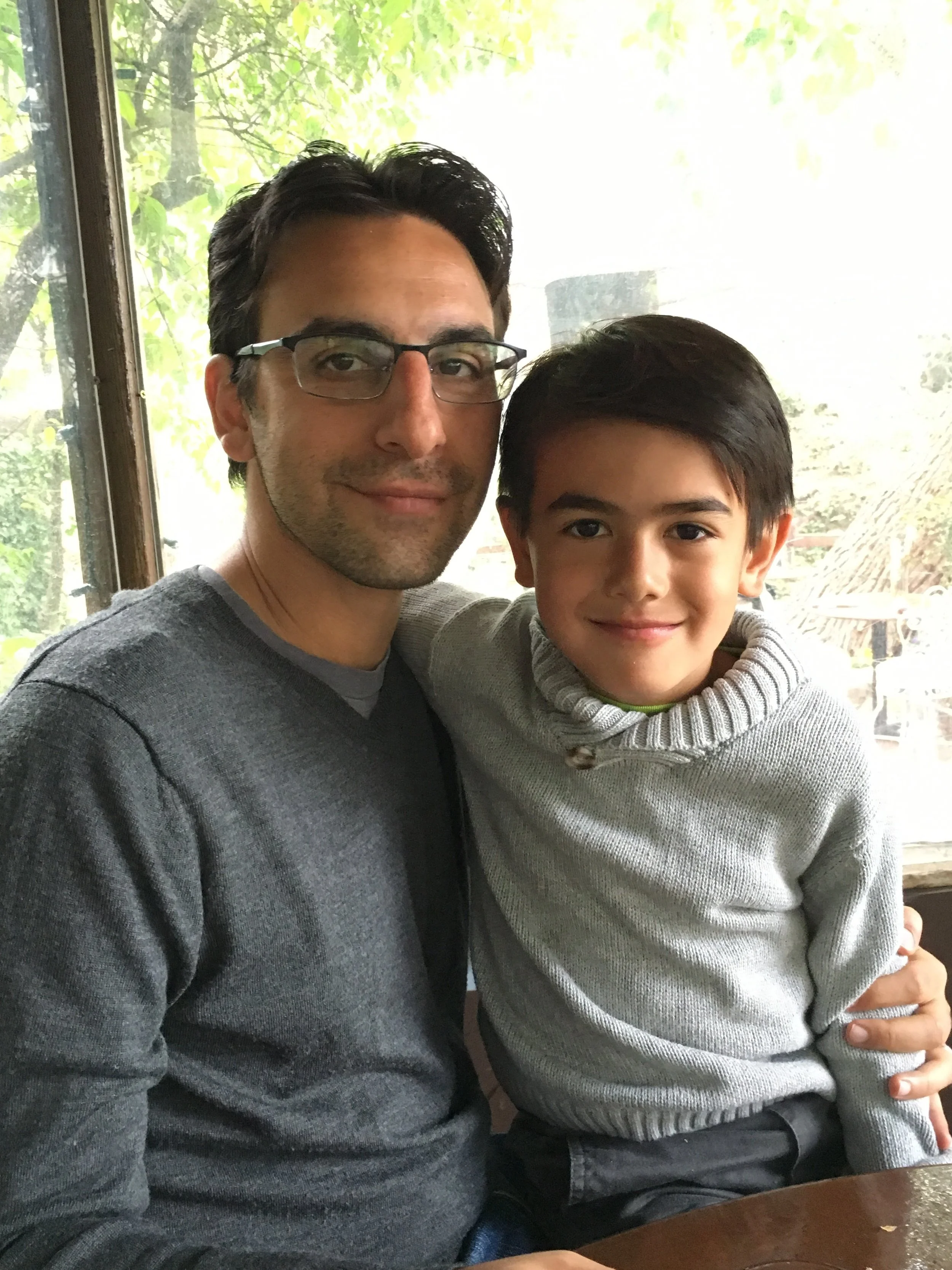 The author, Nafis Shafizadeh, and his four-year-old son Kamil.