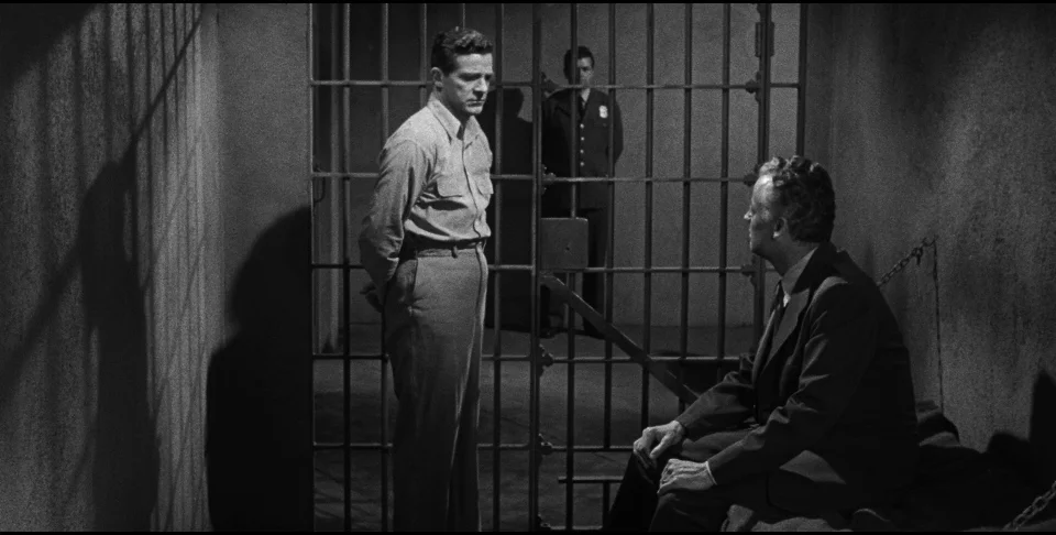 The game seems up for Tom Garrett (Dana Andrews, with Shepperd Strudwick) when his get-out-of-jail card is burned in Beyond a Reasonable Doubt.