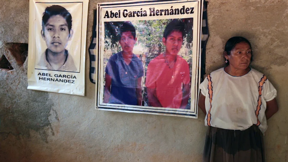  Portraits on a wall depict one of the disappeared in Ayotzinapa, the Turtle’s Way.