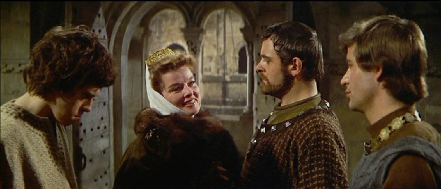An awkward reunion with her sons. Hepburn flanked by Nigel Terry, Anthony Hopkins, and John Castle.