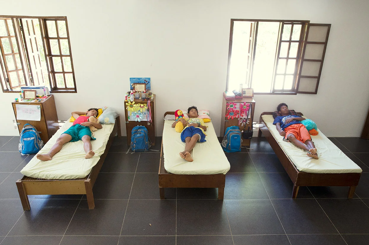 Filipino street children find temporary shelter from the dangers of urban life in Mikala Krogh’s A Year of Hope.
