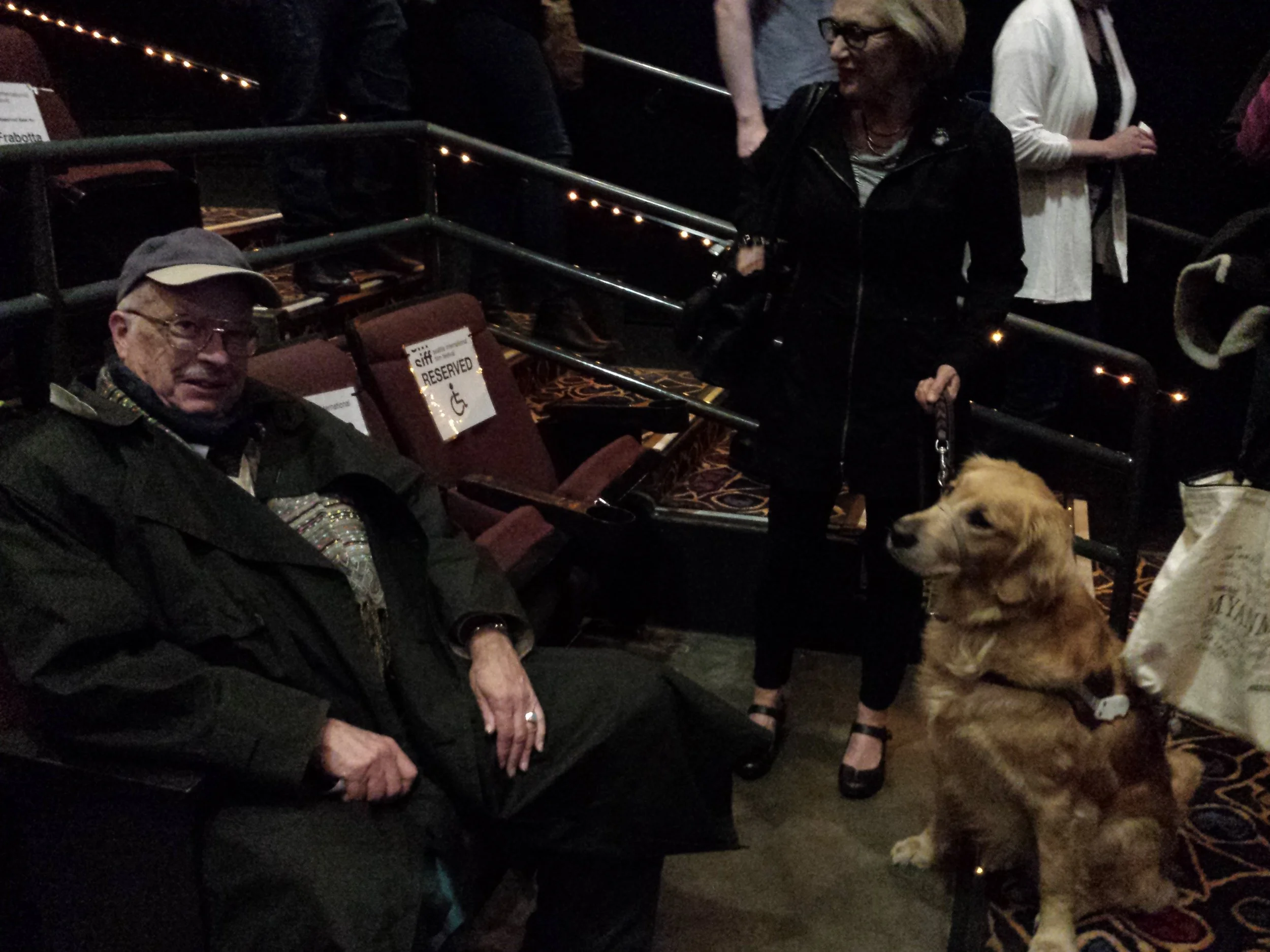A service dog, a trainer, and a critic meet at a screening of Pick of the Litter.