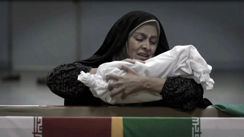 In the final and symbolic scene of Track 143 , Olfat, played by Merila Zare'i, collects the bones of his martyred son after fifteen-years of waiting for him to return home from the eight-year-long Iran-Iraq war. 