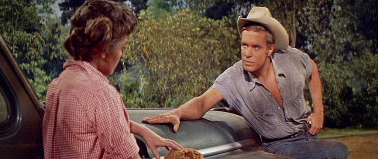 George Peppard as Rafe with Libby Halstead (Luana Patten).