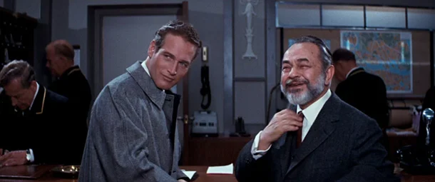 Craig and fellow Laureate for physics, Dr. Max Stratman, played by Edward G. Robinson.