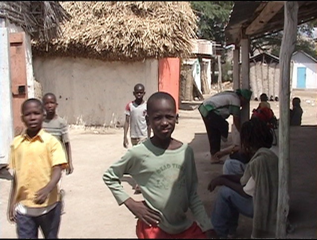  Boys approach me and my distancing camera near where we stayed in Souvnans. 