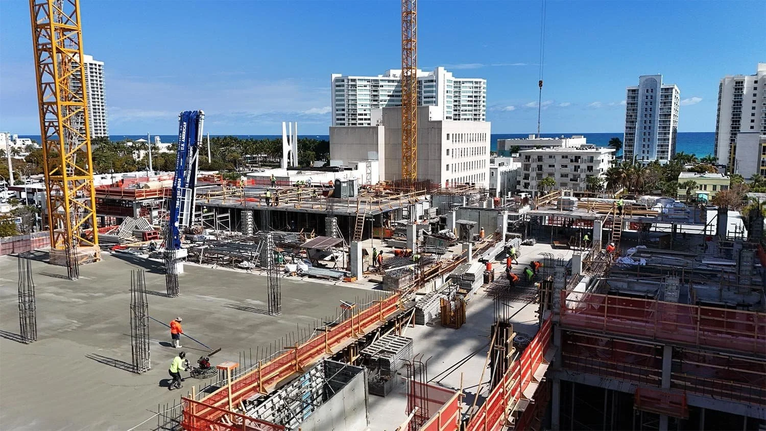 Aerial drone view of an active construction project in Miami showing site progress and development