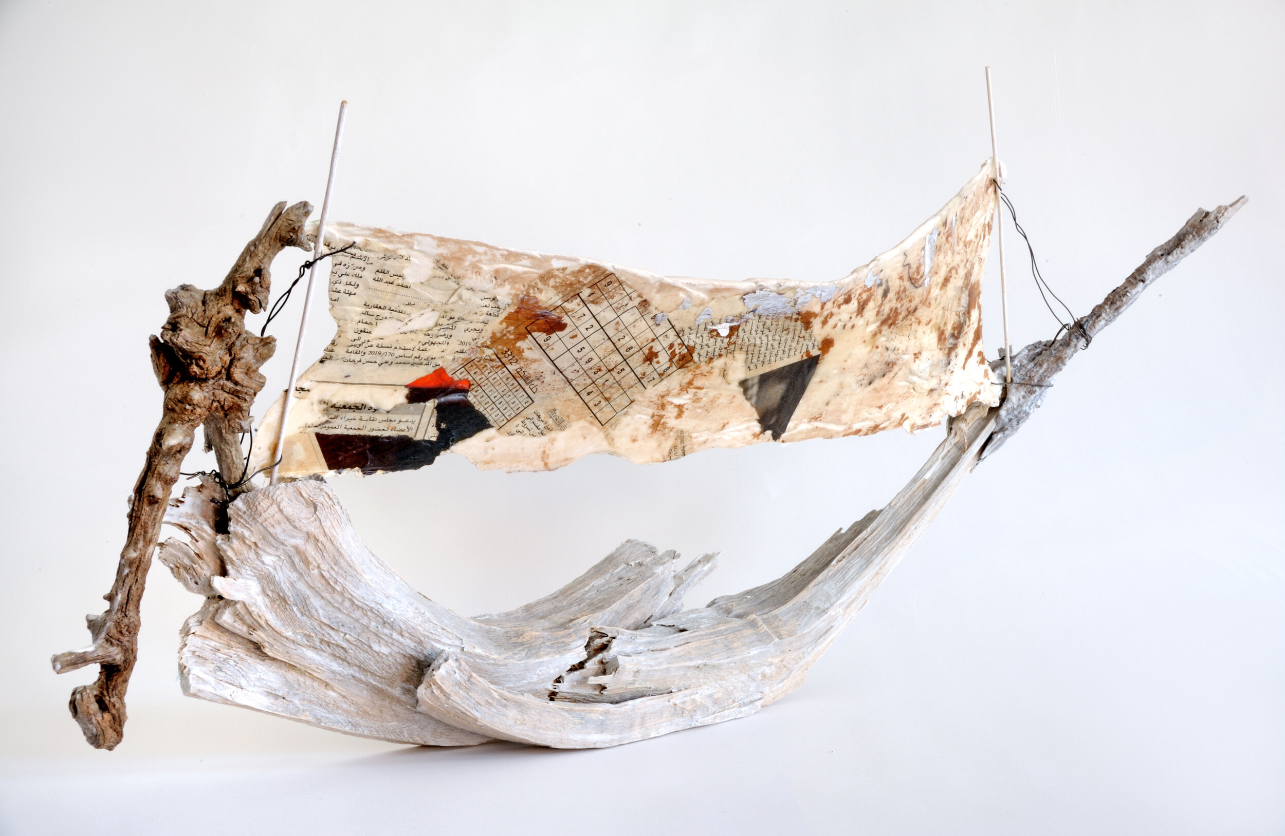 NIGHT BOAT FOR JOE: insect-inscribed tree branches, tree bark, acrylic paint, canvas, newspaper, wire, glue, oystershell 30”x 9”x 15”
