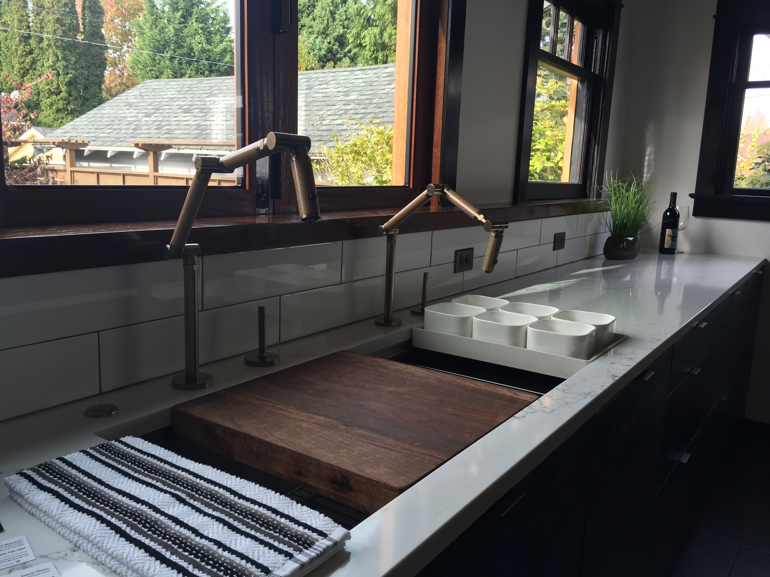This home in NE had been recently remodeled, and they did a great job with the kitchen. The countertops were beautiful, but I especially loved the wood block insert that extended the counter into the sink.