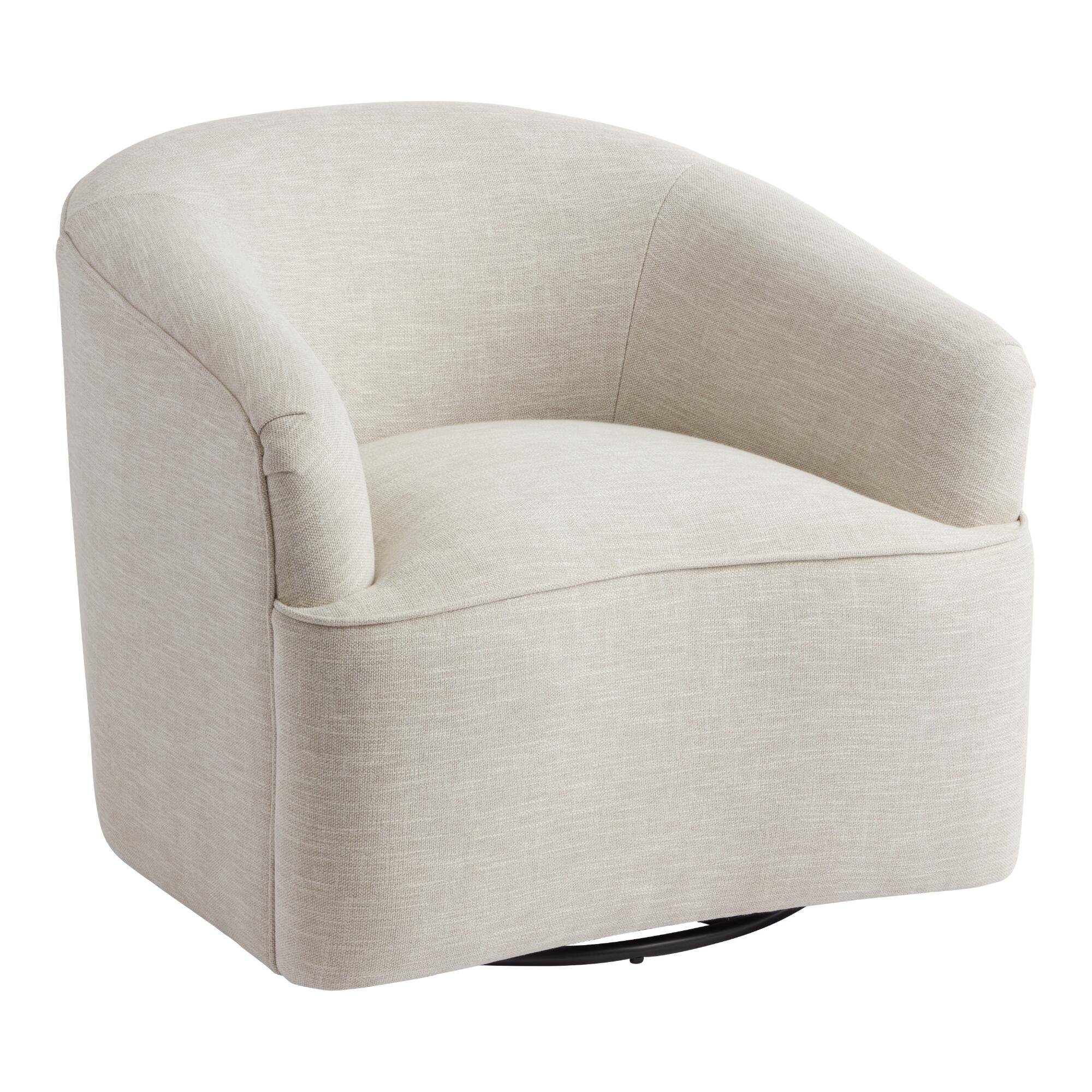 World Market - $449.99 - Ivory Curved Back Odin Upholstered Swivel Chair