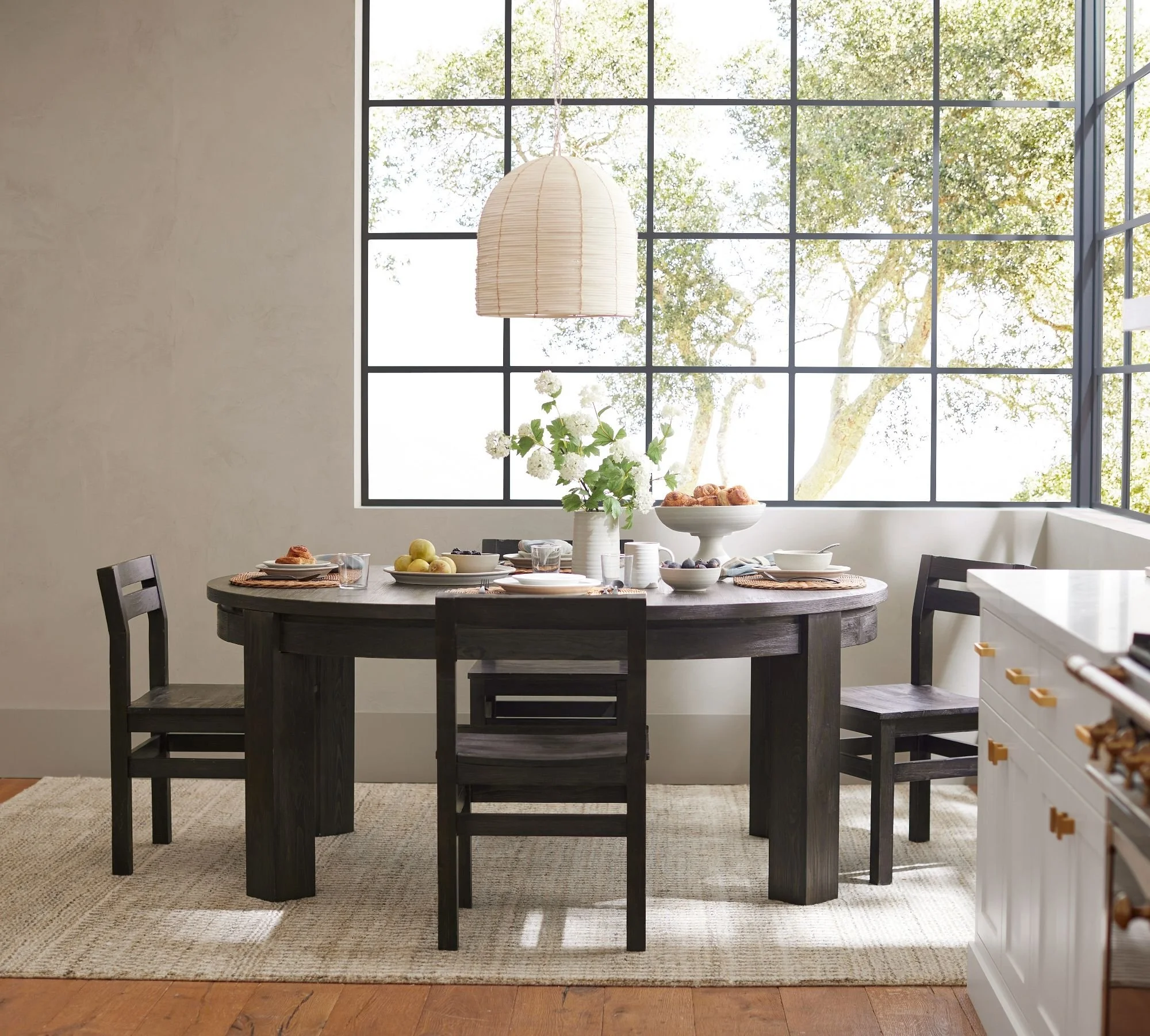 Pottery Barn - $1,529 - Folsom Round Storage Extending Dining Table