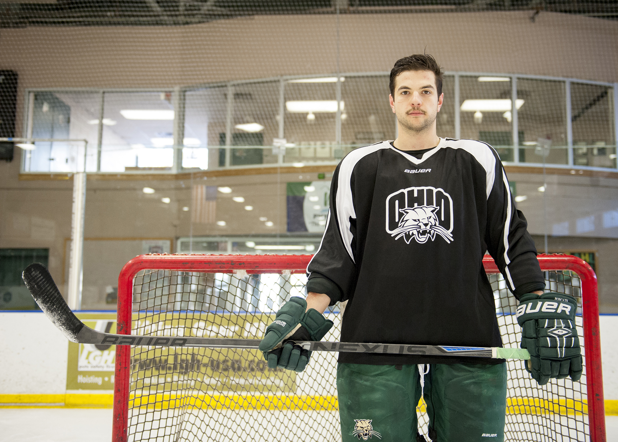 Ohio senior defender Paul Sergi poses for a portrait in Bird Arena in Athens Ohio. Through 16 games, Sergi has scored six goals and tallied eight assists for the Bobcat hockey team and has helped them to a 12-2-2 record.
