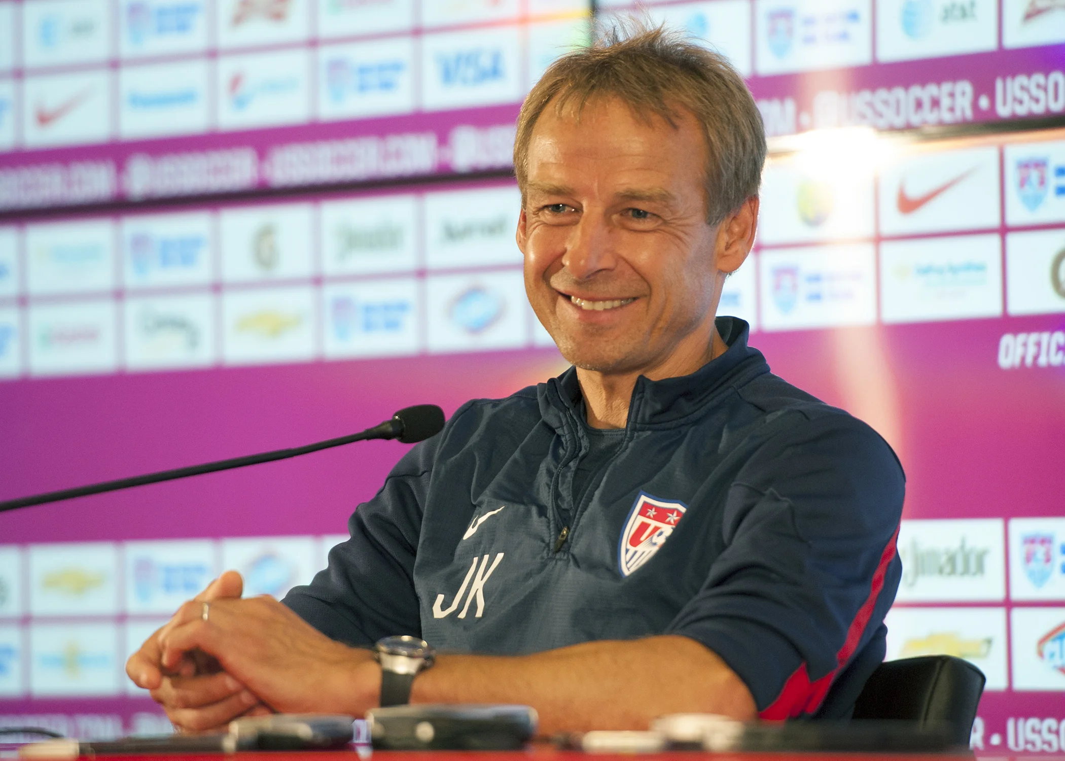 United States head coach Jürgen Klinsmann smiles while answering questions during a press conference at São Paulo FC's training ground on June 27, 2014