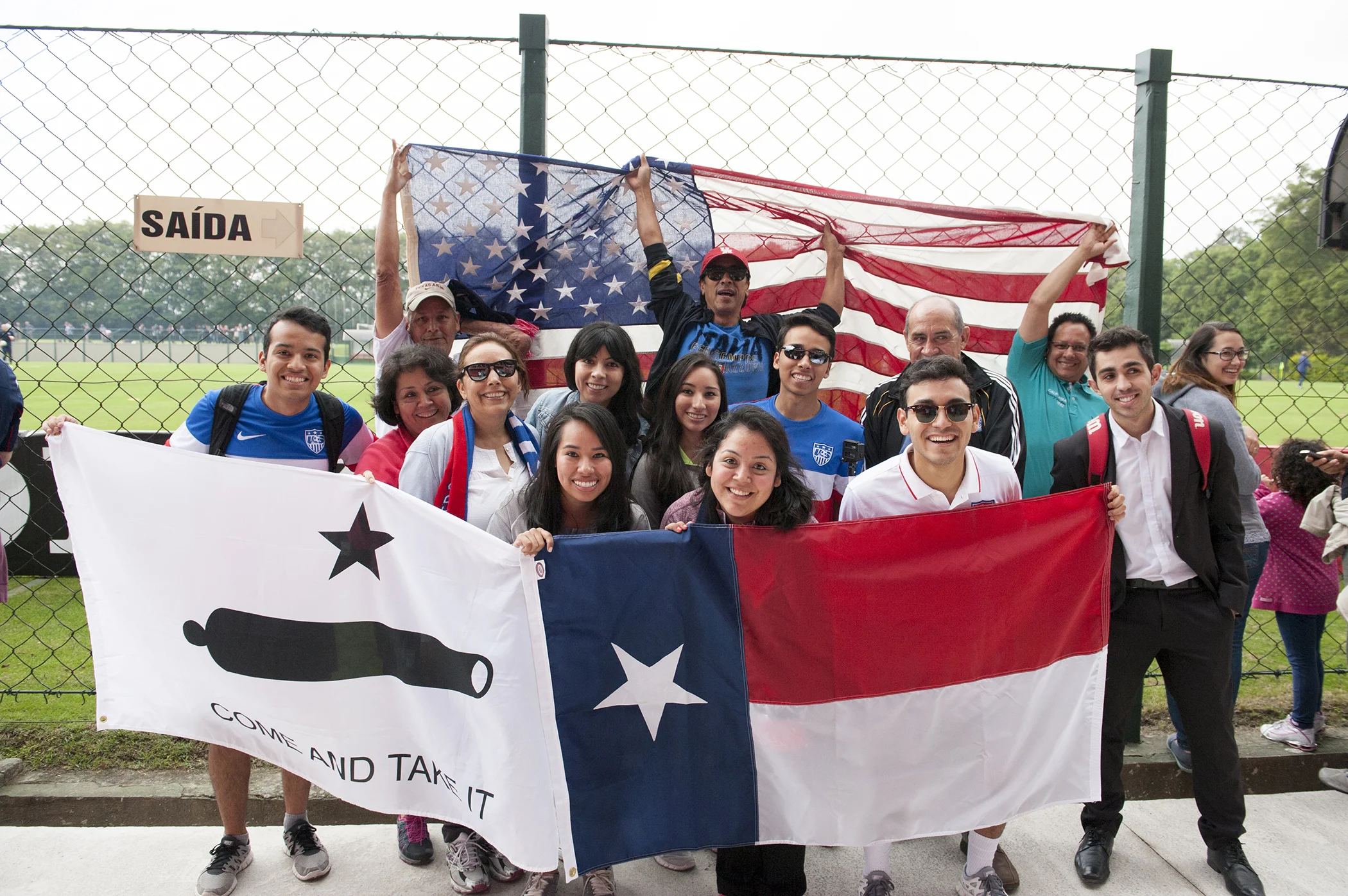 The Mayorga-Oquenda family from Houston, Texas shows their support for the U.S. Men's Team during an open training session at Sao Paulo FC's training ground in Sao Paulo, Brazil on June 11, 2014.