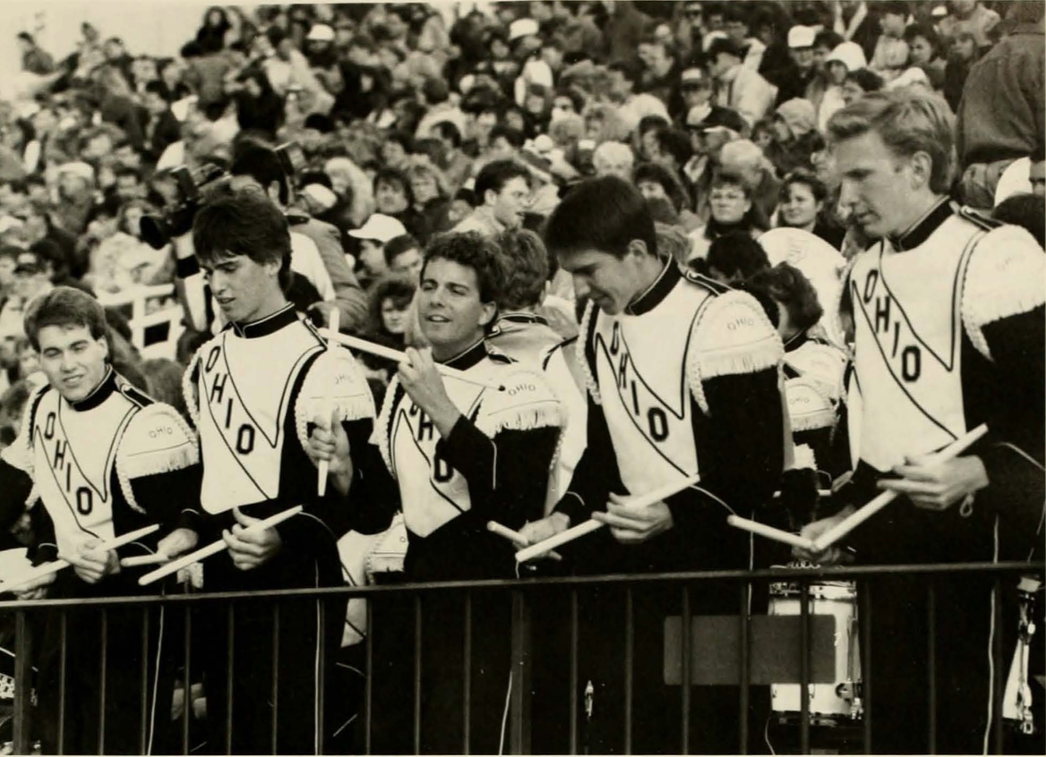 The Marching 110 Drum line performs during the 1991 season at Peden Stadium. (COURTESY OF OHIO UNIVERSITY LIBRARY DIGITAL COLLECTION)