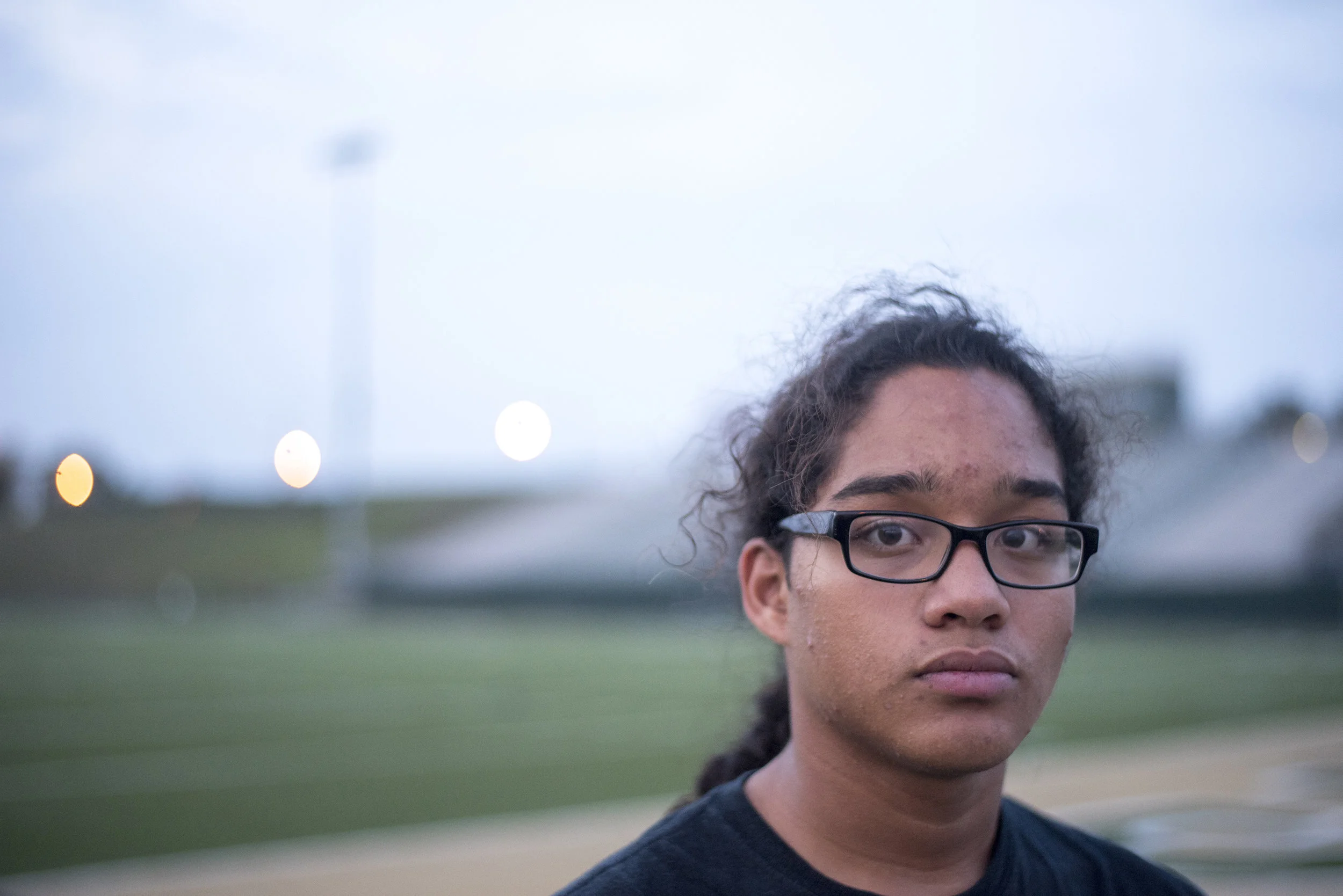 Athens High School sophomore Miguel Santiago-Flores poses for a portrait at R. Basil Rutter Field. Santiago-Flores is slowly coming out as bisexual to his soccer teammates.