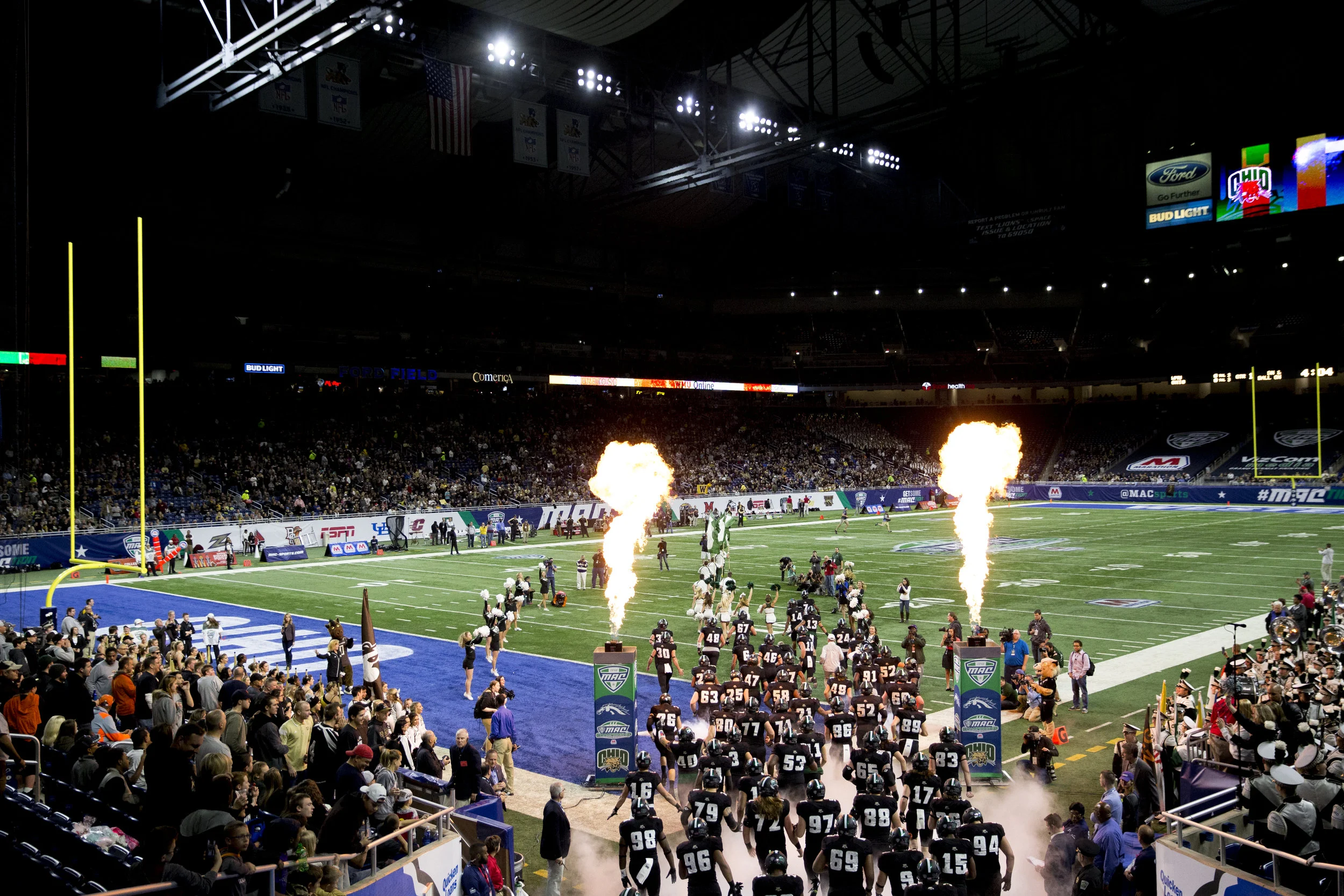 The Ohio Bobcats run out onto Ford Field before the start of the Marathon MAC Championship Game against Western Michigan. A late Bronco interception sealed a 29-23 loss for Ohio.