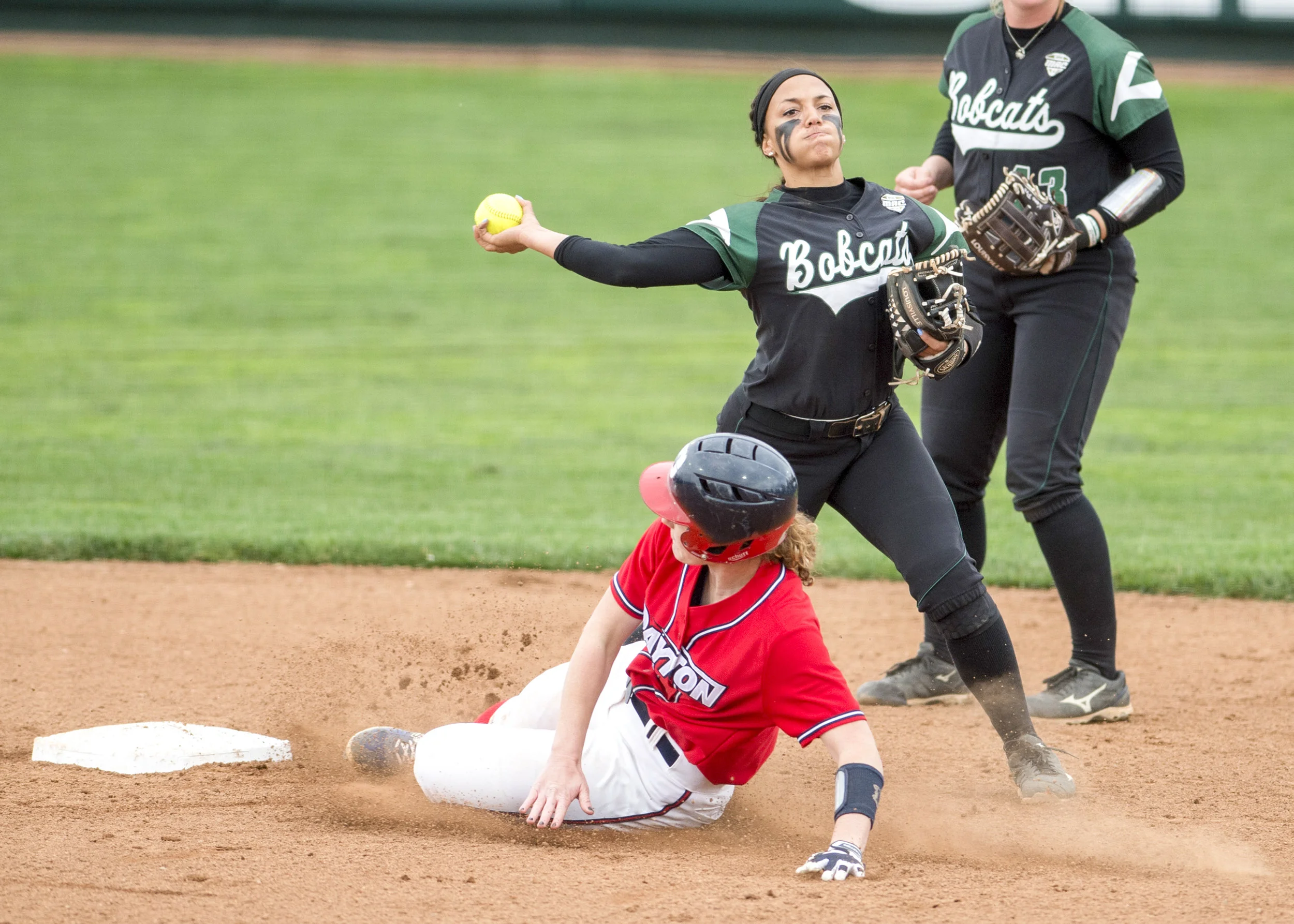 Ohio junior infielder Amanda Dalton pulls a double play in the top of the second inning against Dayton on Tuesday, April 14, 2015 at the Ohio Softball Field.