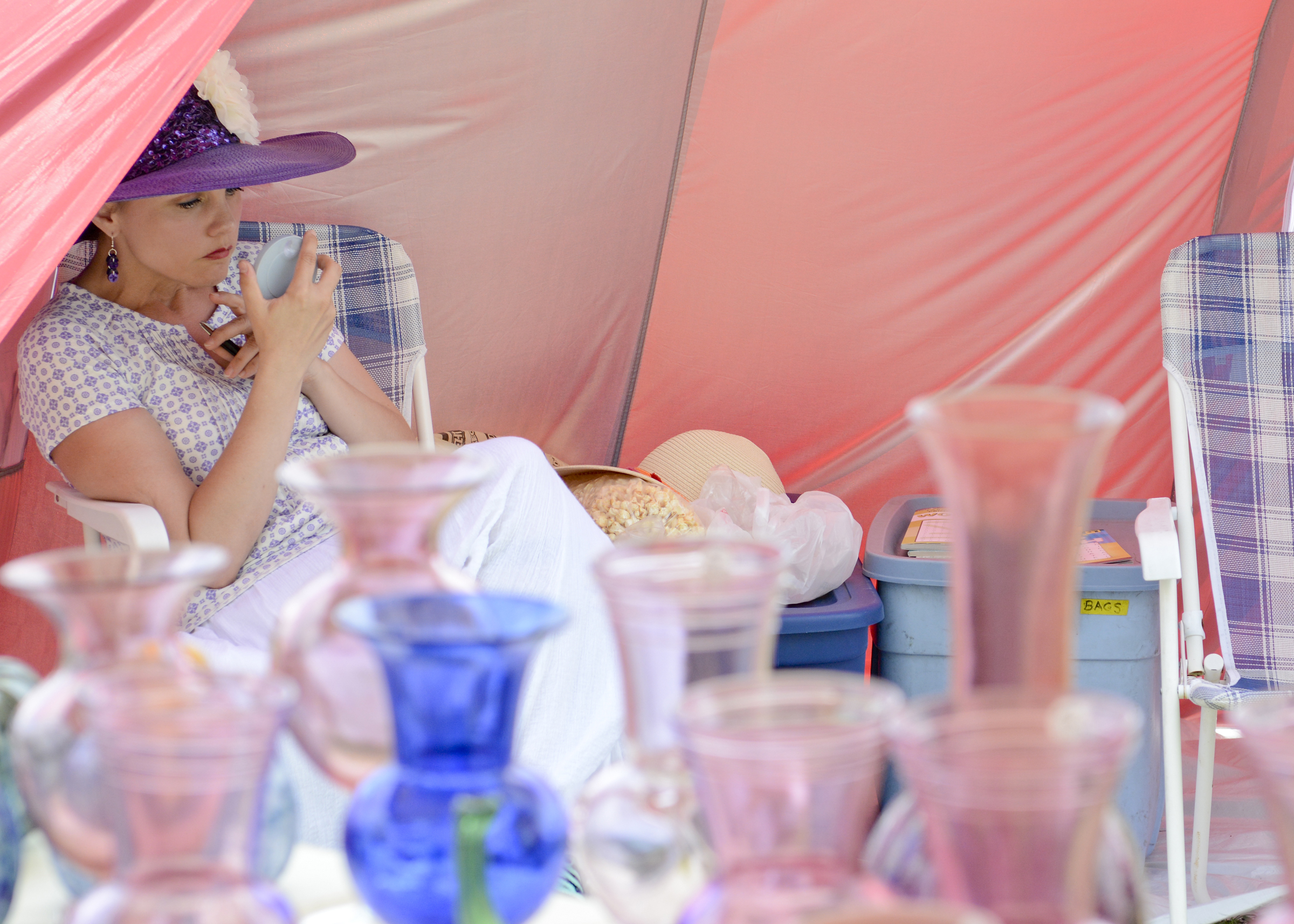 Tammy Stubbins of Woodstown, New Jersey checks her makeup at the Kutztown Folk Festival on July 5, 2017.