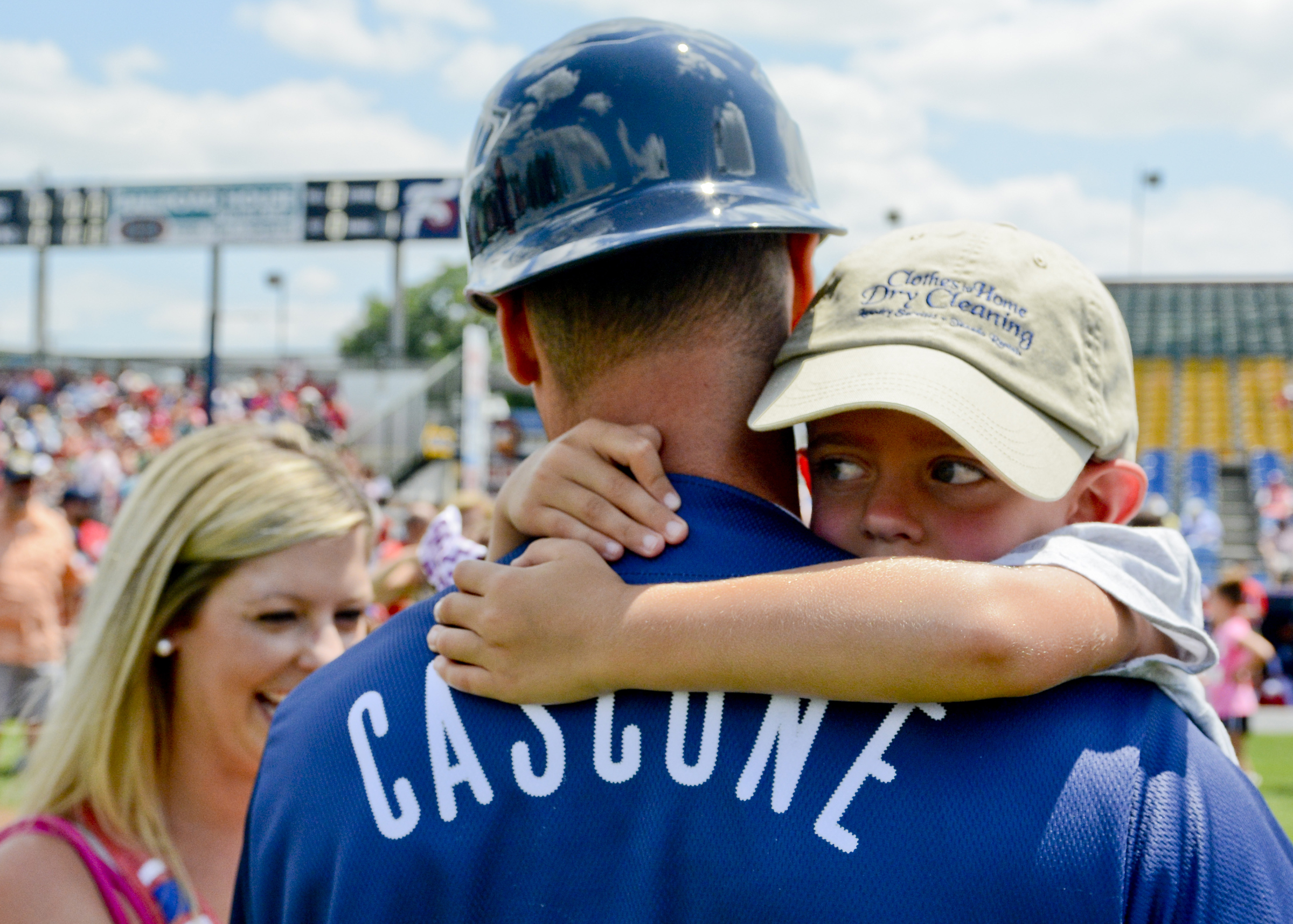 Greyson Cascone, 5, of Boyertown holds on tight to his father, Air Force Recruiter Micah Cascone. Micah was stationed in Charleston, South Carolina but came up to Reading to surprise his family at the Reading Fightin Phils game on July 16, 2017.