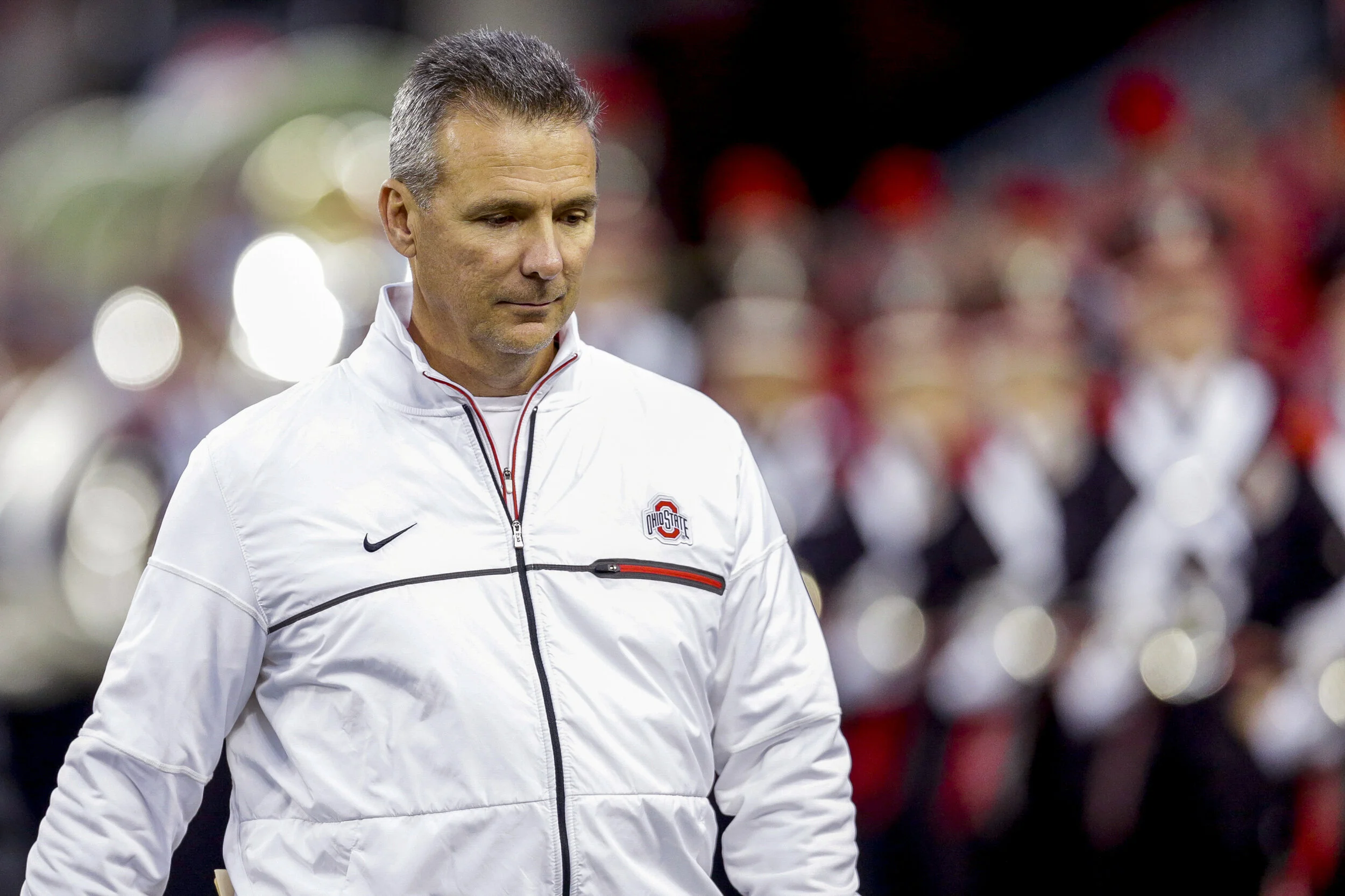 Ohio State head coach Urban Meyer walks back to the sidelines after Senior Day introductions ended before the Buckeyes’ game against Illinois on November 18, 2017.