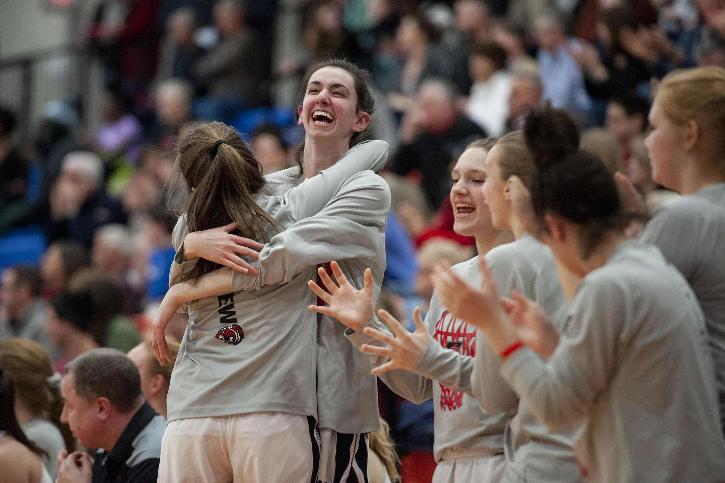 Sophomore guard Kiersten Stafford (right) hugs sophomore forward Sydney Weed (left) during a Tigers’ run in their PIAA First Round State Playoff game against Avonworth at the Hagerty Family Events Center in Erie, PA on March 8, 2019. 