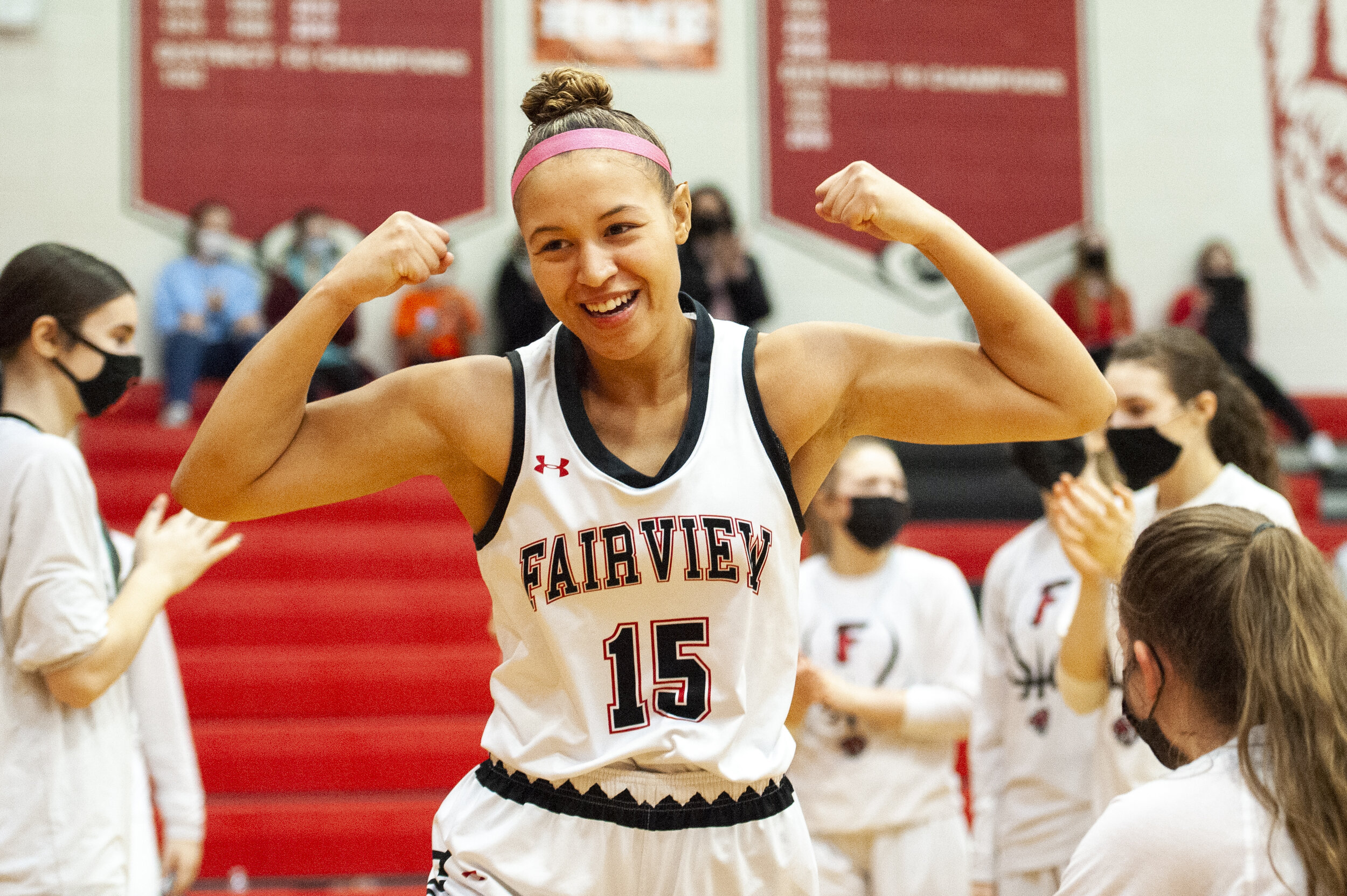 Fairview High School senior forward Jada McBride (#15) flexes during the pre-game introductions before the Tigers’ game against North East in the District 10 Class AAA quarterfinals. The Tigers would go on to win 35-20.