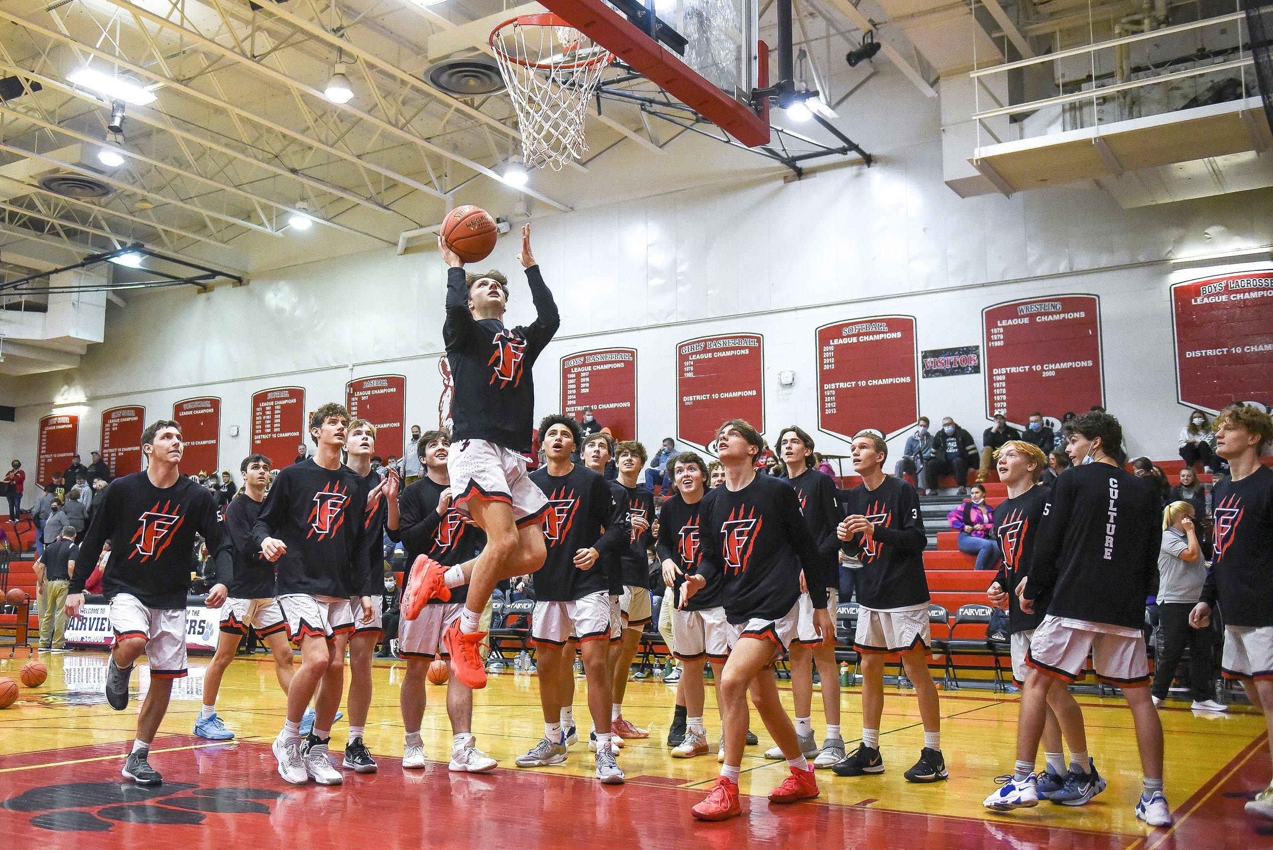 Fairview junior guard Zach Scott (center) goes up for the final layup before the start of warmups for the Tigers’ game against Seneca in the 2021 Tip Off Classic on December 10, 2021.