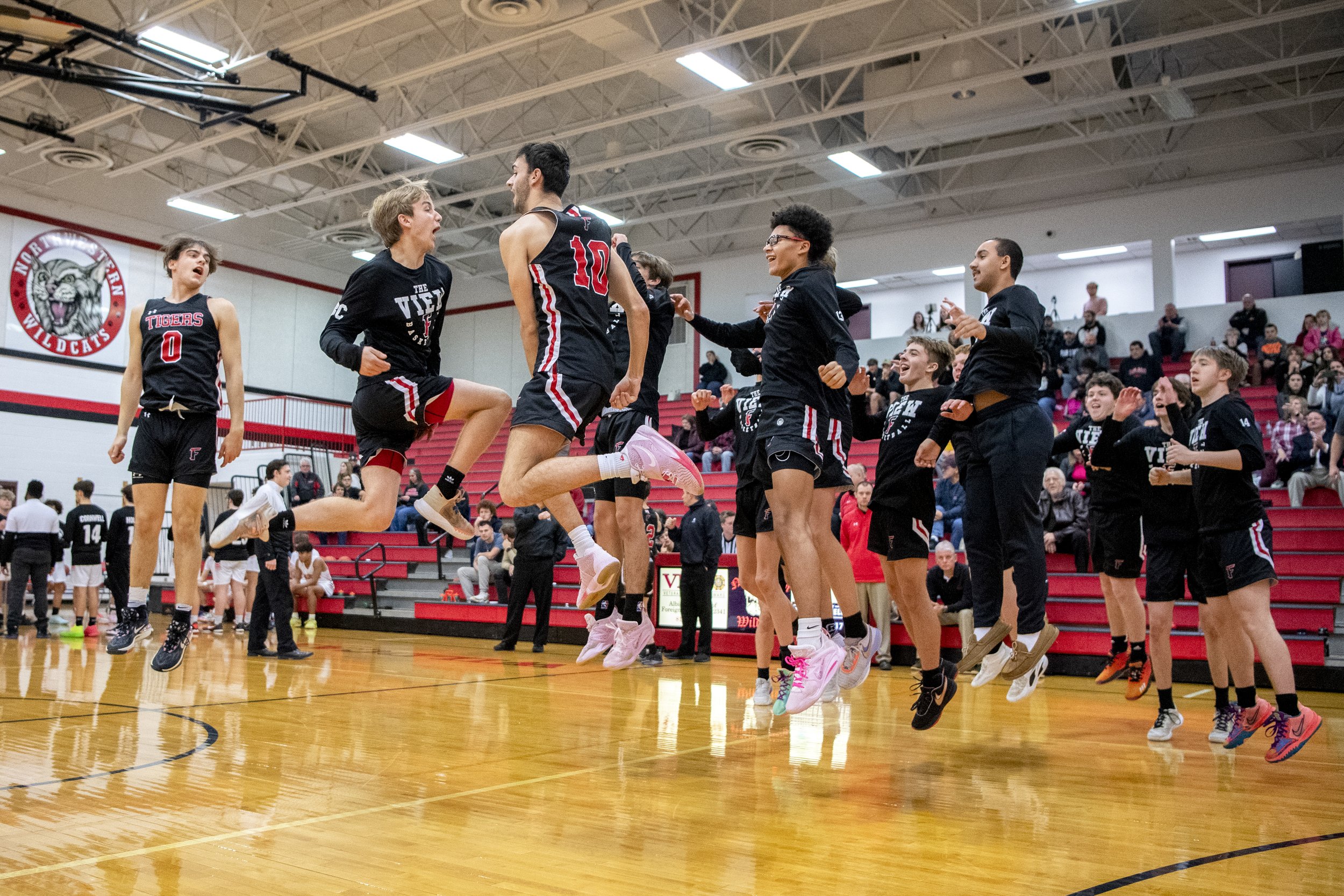 The Fairview boys basketball team goes through their pregame pump up celebration before the start of their game against Northwestern on January 10, 2023 at Northwestern High School.