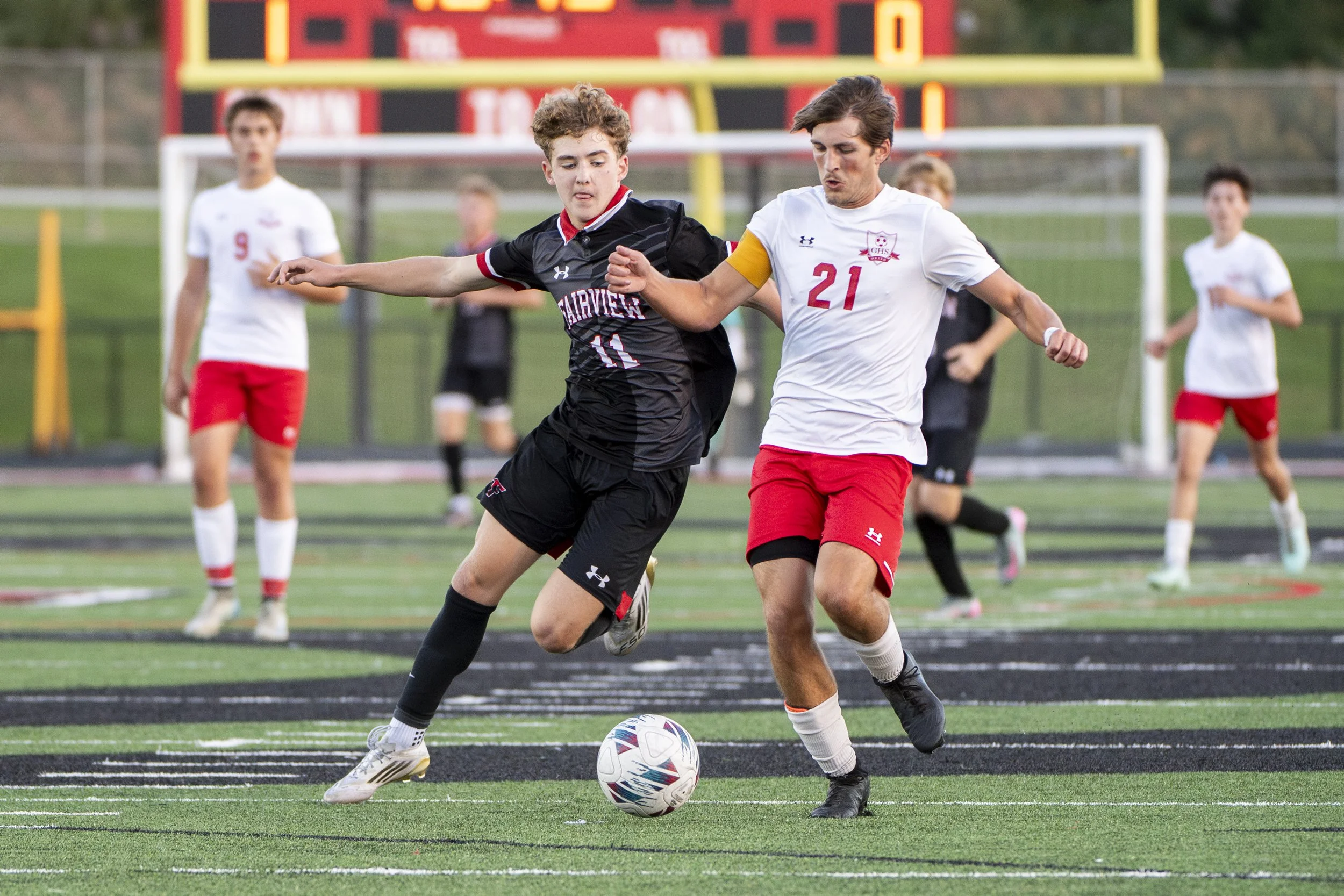  Fairview sophomore midfielder Joey Chiocco (#11) battles for the ball with Girard senior midfielder Owen Pecorella during the first half of Fairview’s 7-1 win on September 10, 2025. 