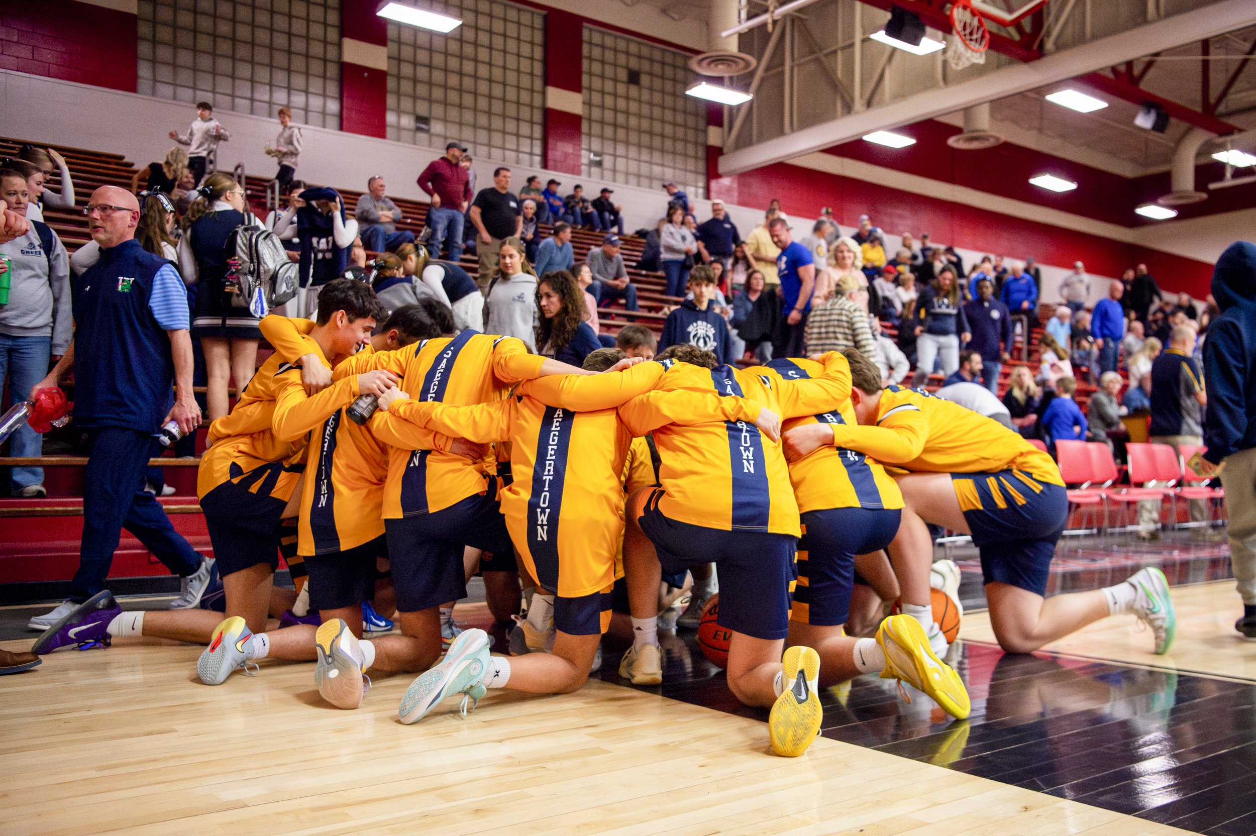  The Saegertown High School boys team goes through a pre-game prayer in their huddle before the start of their PIAA District 10 Class 2A 3rd Place game against Greenville on February 27, 2026 at Meadville High School. With their 66-60 win, the Panthe