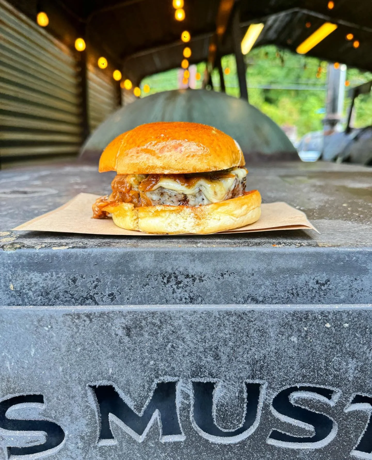 Back by Popular demand, it&rsquo;s our smoked Sunday burger special. House-ground brisket beef patties, seasoned and smoked low and slow then a quick stop on the flattop to melt some American cheese, and add a pickle and a hoodoo burger sauce. These 
