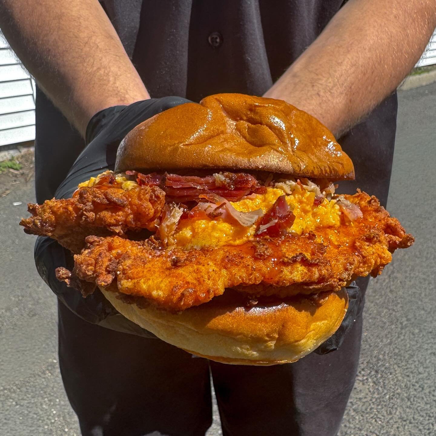 A tradition unlike any other. The masters inspired smoked fried chicken sandwich, with hot honey pimento cheese and chopped crispy pork belly. Enjoy it while supplies last. #hoodoobrown #bbq #themasters