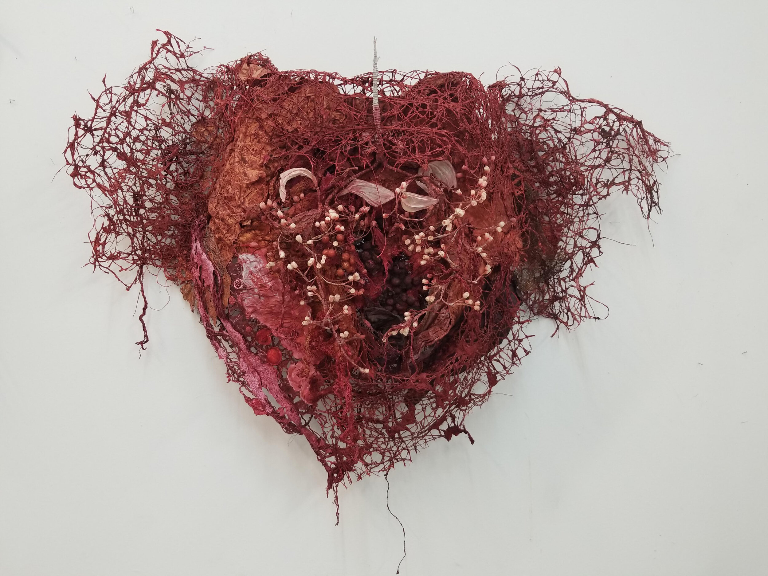   Nourish , 2018, handmade paper, wire, jute, clay, dye, 30” x 40”    