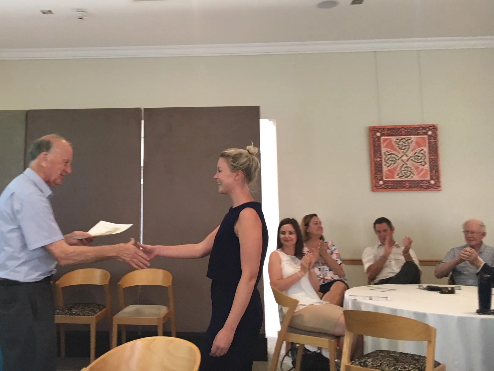 Br John Horgan presents Shaunna Kilcullen with her membership certificate
