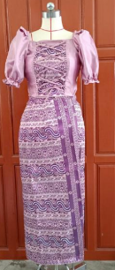 An example of the beautiful dresses that the students sew.png