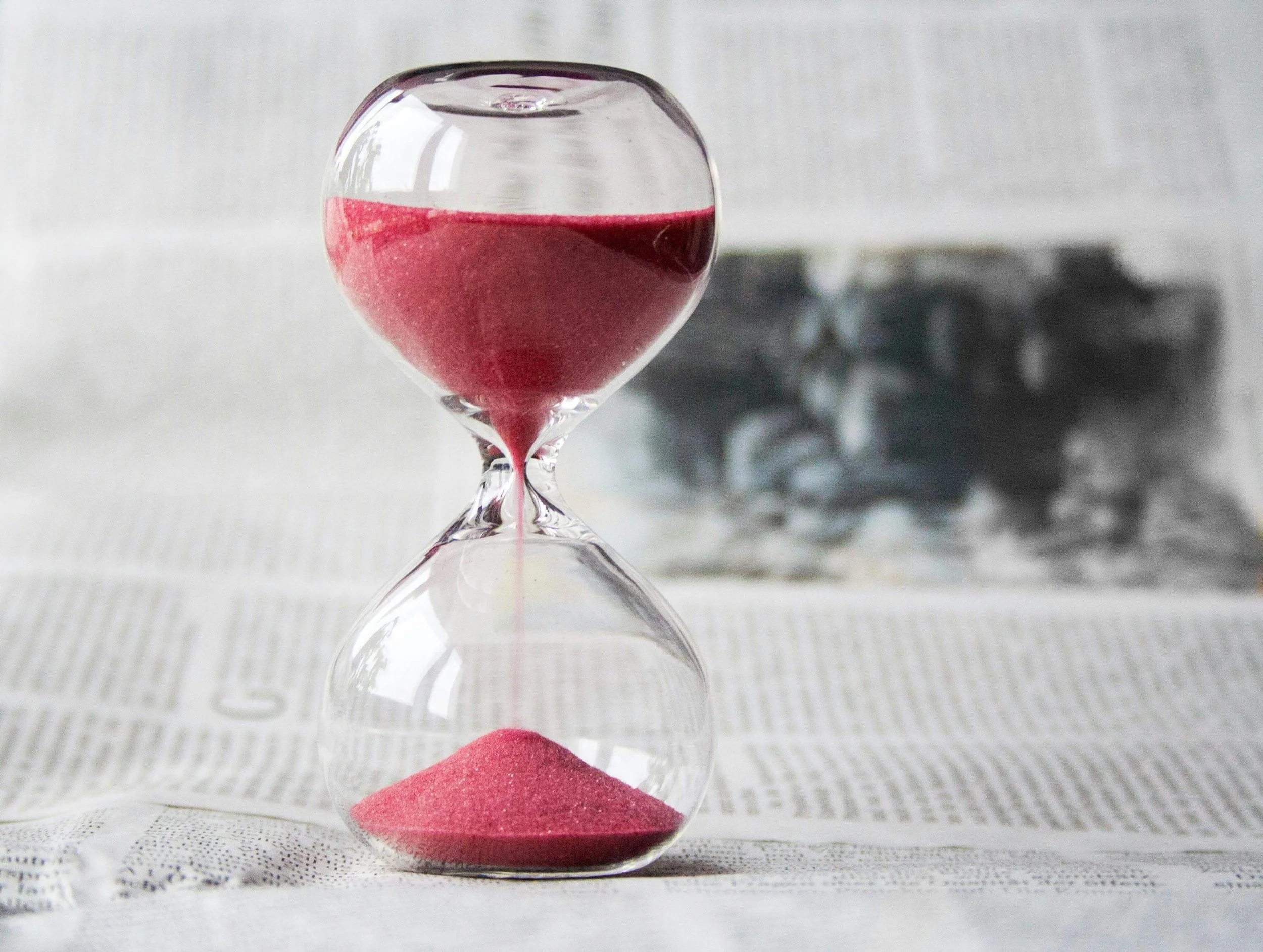 Clear Glass with Red Sand Hourglass