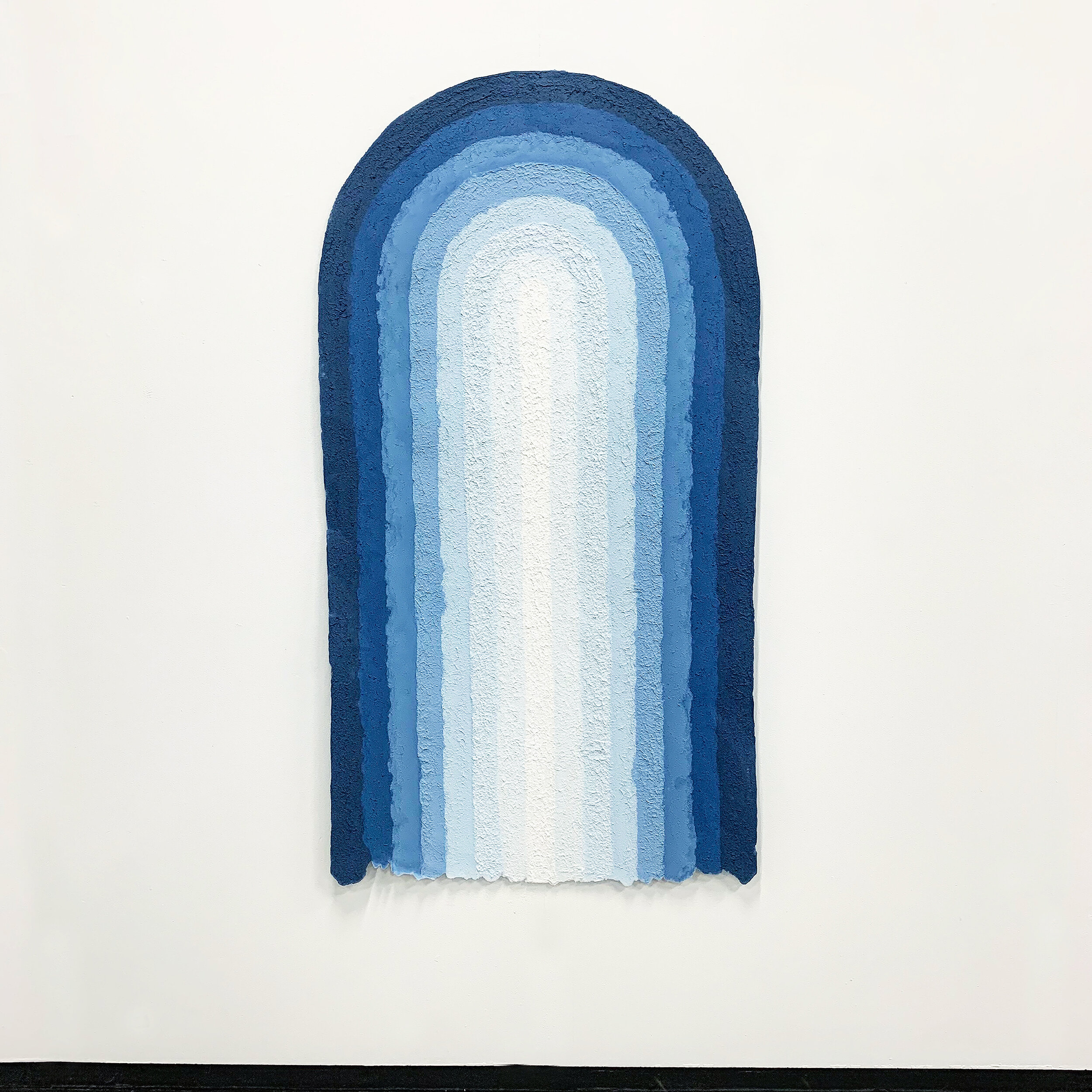    Softest hard  #2  , 2019.   Hand-made paper, from indigo-dyed salvaged textiles (cotton bedsheets). 76cm (w) x 140cm (h) 