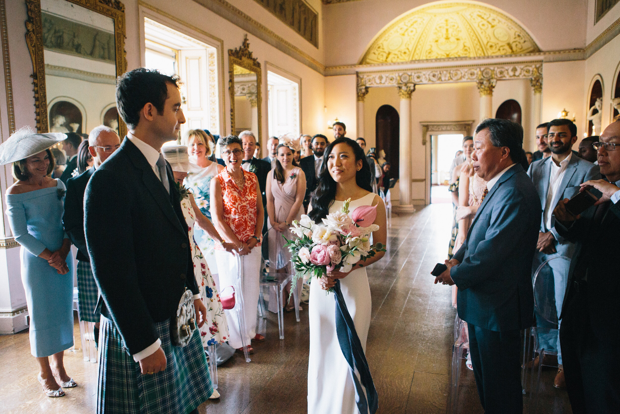 Bride walking down the isle at Syon Park