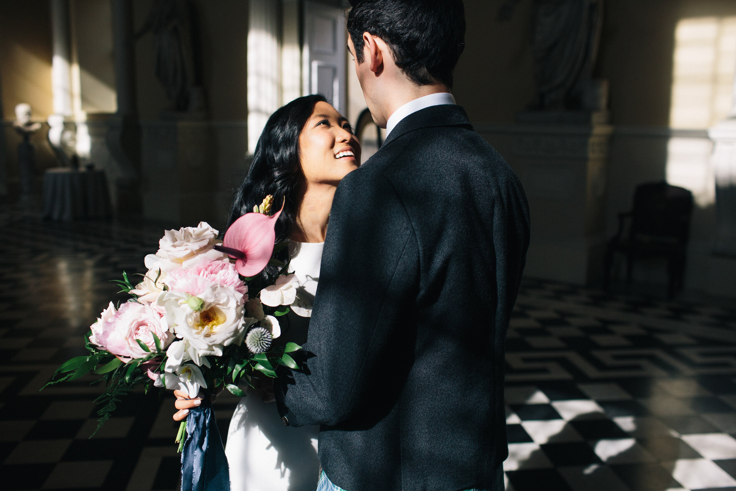 Bride and Groom with bouquet at Syon Park