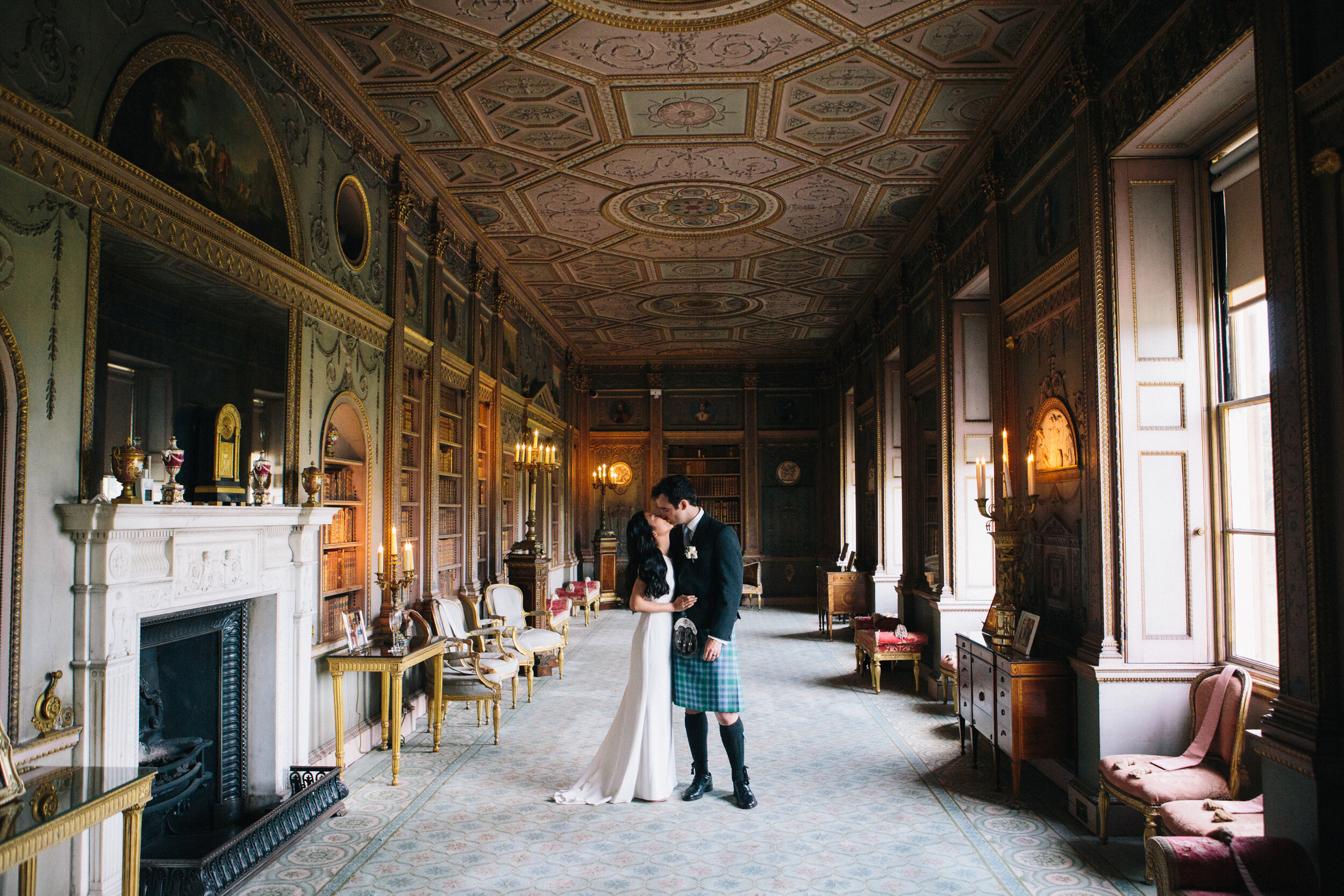 Bride and groom kissing at Syon Park wedding venue