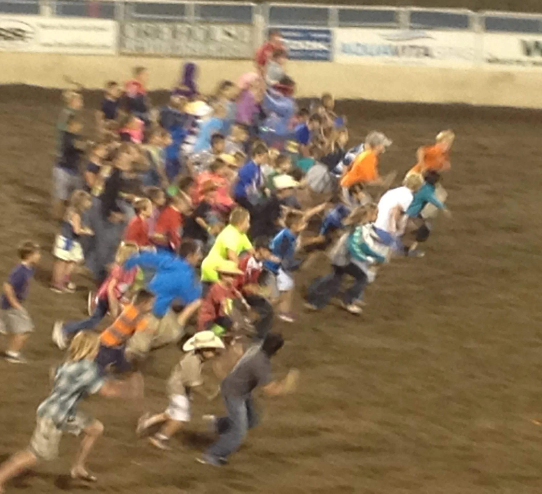 Kids taking off for the "Calf Scramble" at the Steamboat Springs Pro Rodeo Series