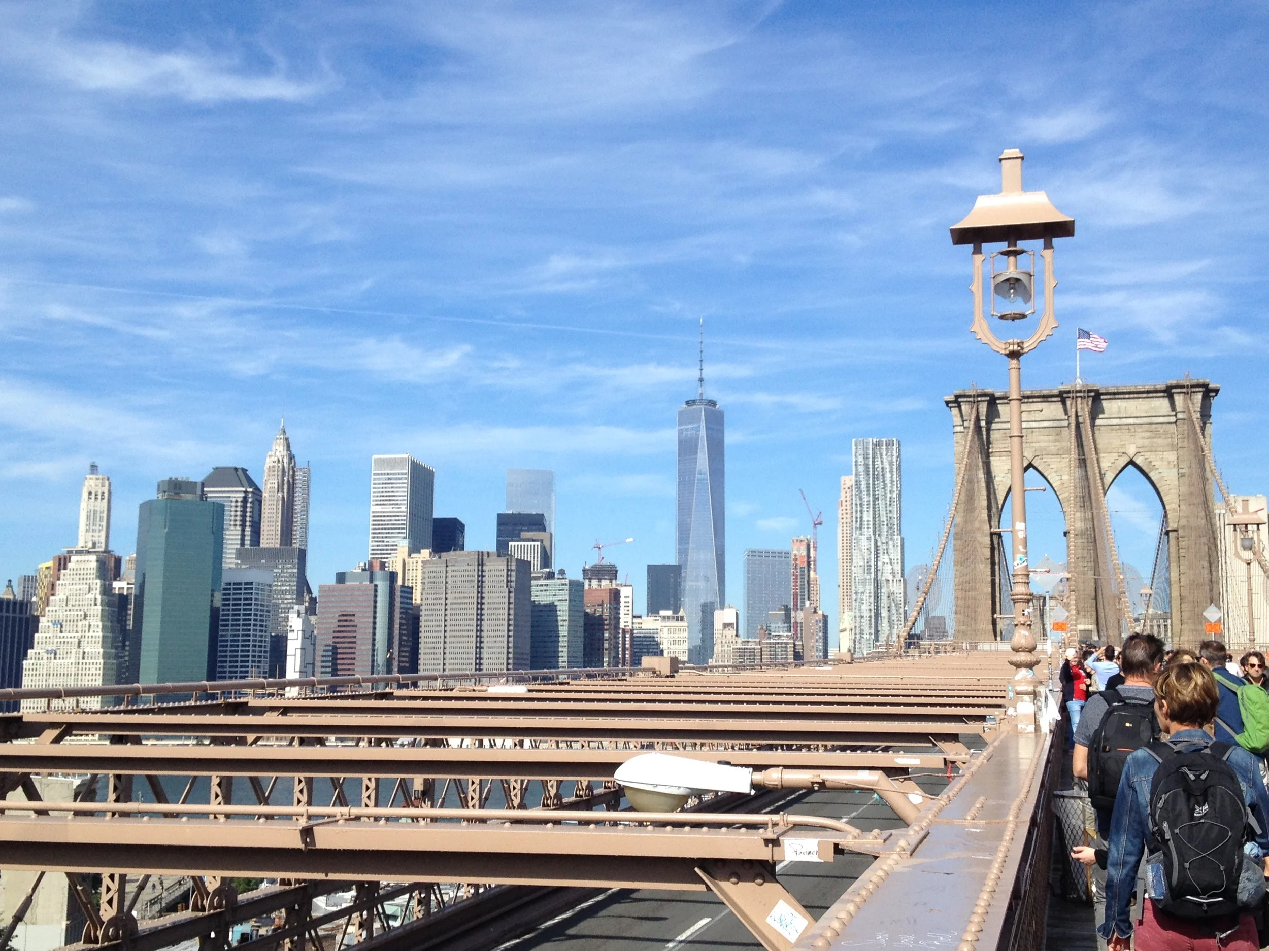 Walking across the Brooklyn Bridge into downtown Manhattan