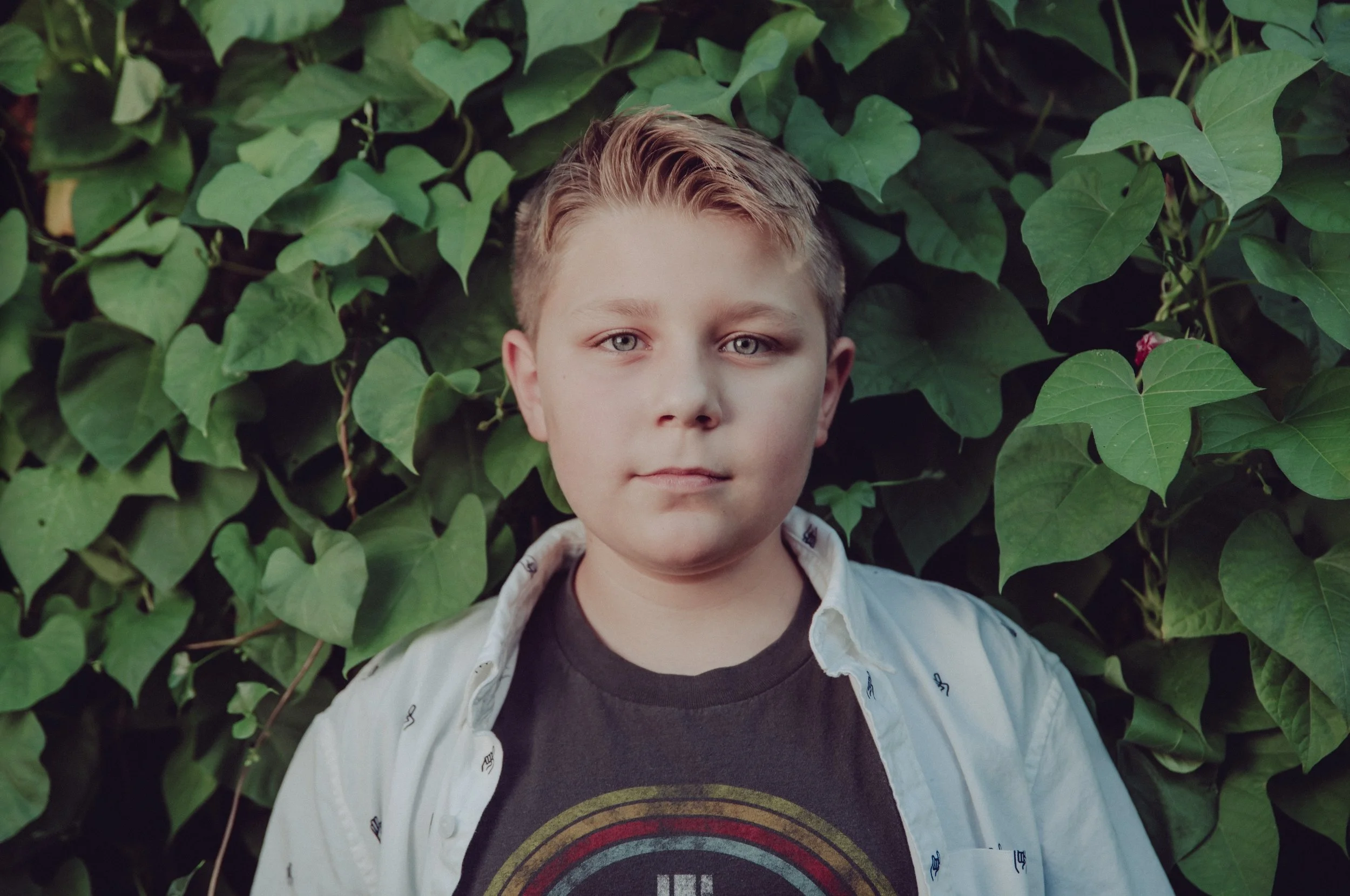 Roman moody kids portrait with vines.jpeg