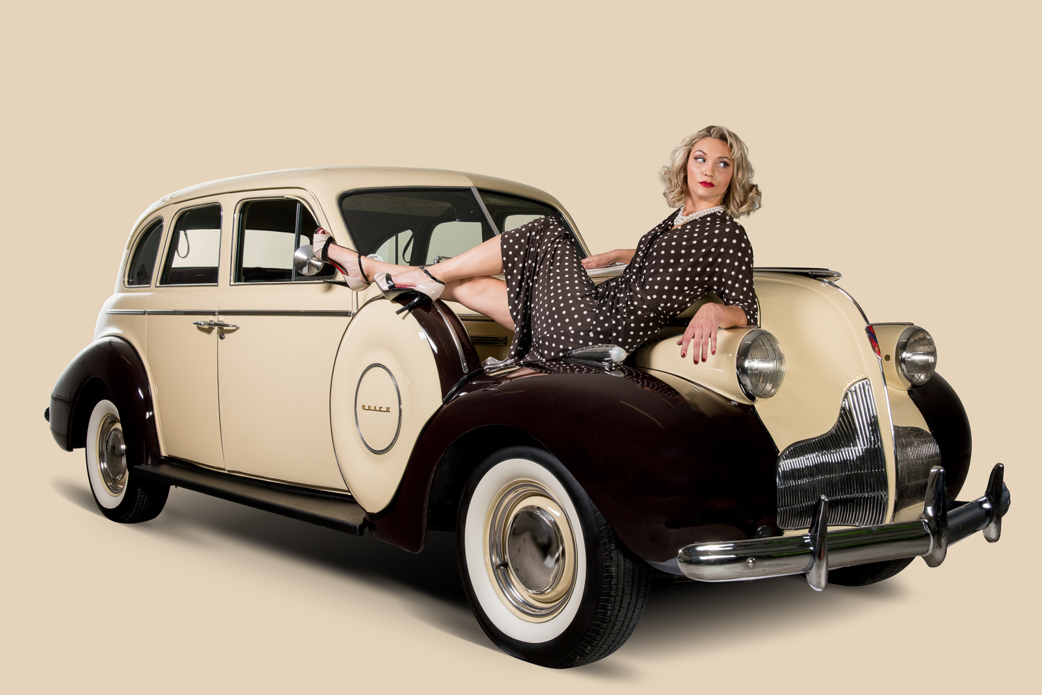 7commercial photography of cars with models in pin-up poses.jpg