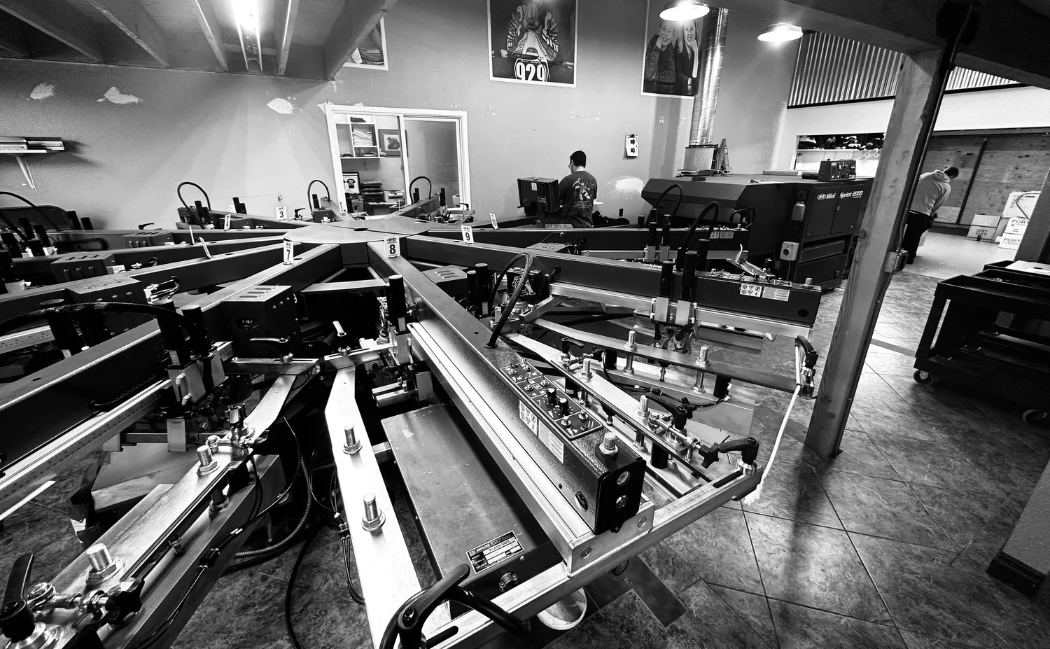 Screen printing press at J&D Custom