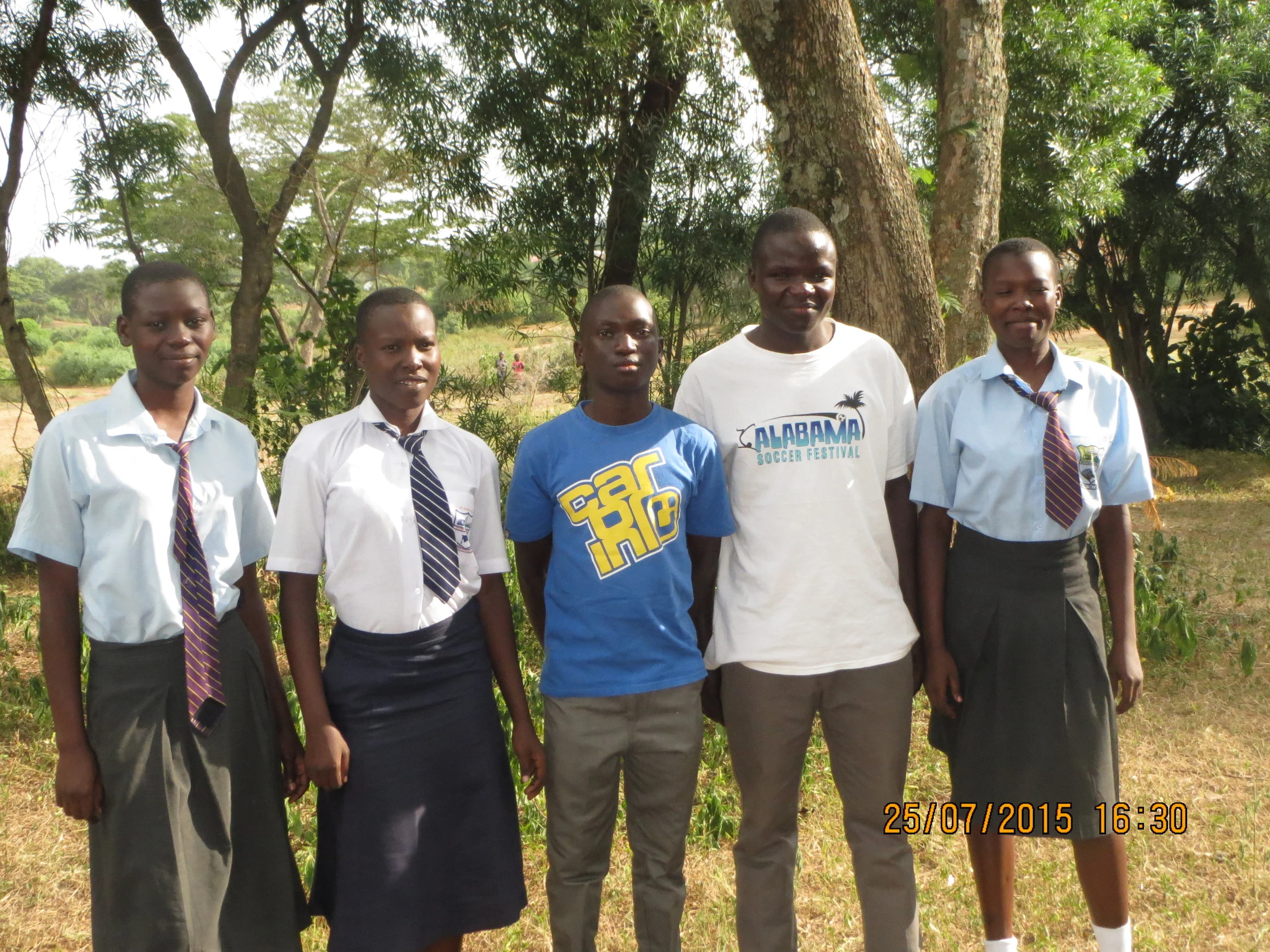 Nancy, Lorrine, Kennedy, Brian and Lavine are Secondary School students supported by KOFUP