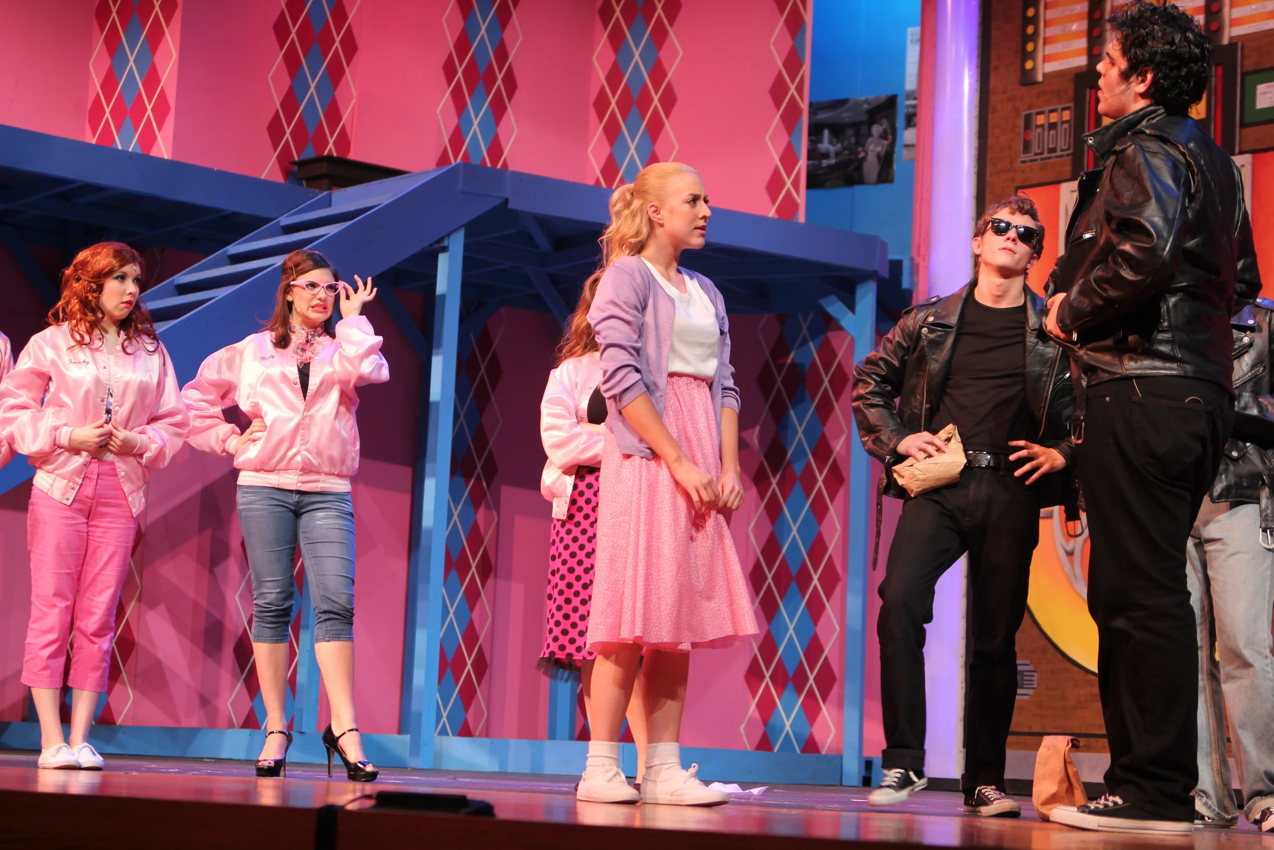   Grease   Directed by: Maggie Rodriguez  Production Designer and Technical Director: Joshua Heerssen 