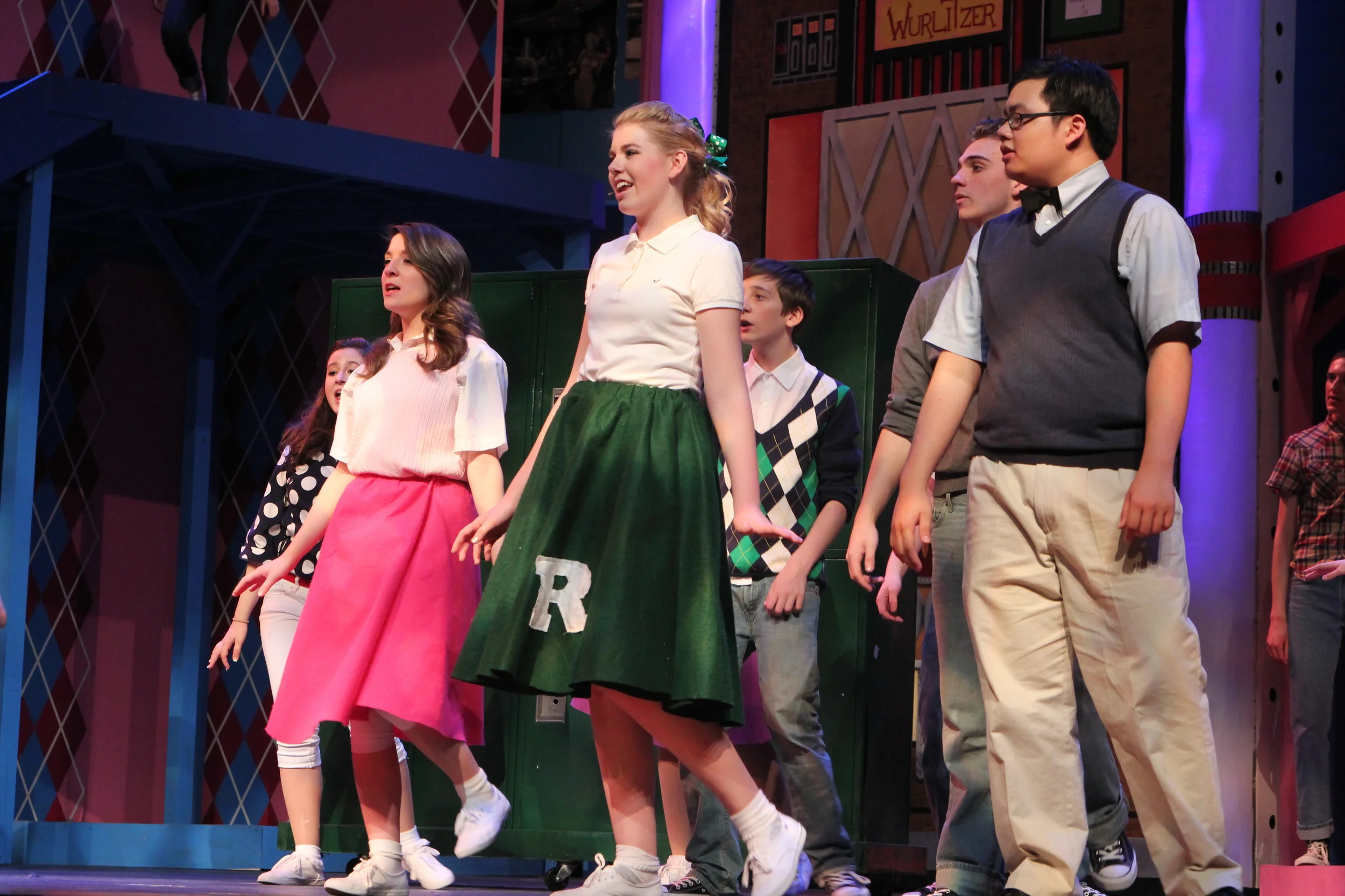   Grease   Directed by: Maggie Rodriguez  Production Designer and Technical Director: Joshua Heerssen 